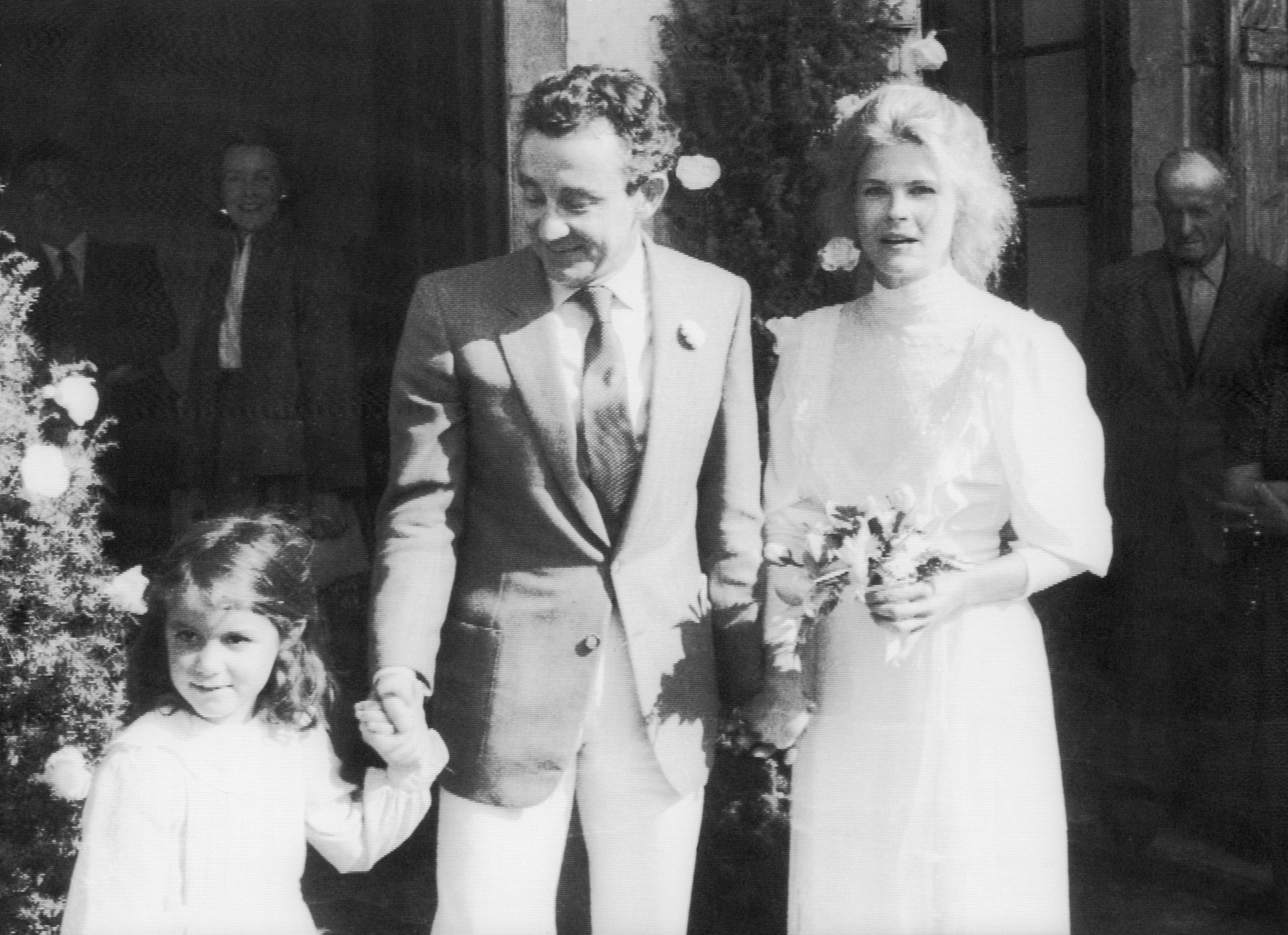 Actress Candice Bergen and French movie director Louis Malle after their wedding in the small village of Lugagnac.