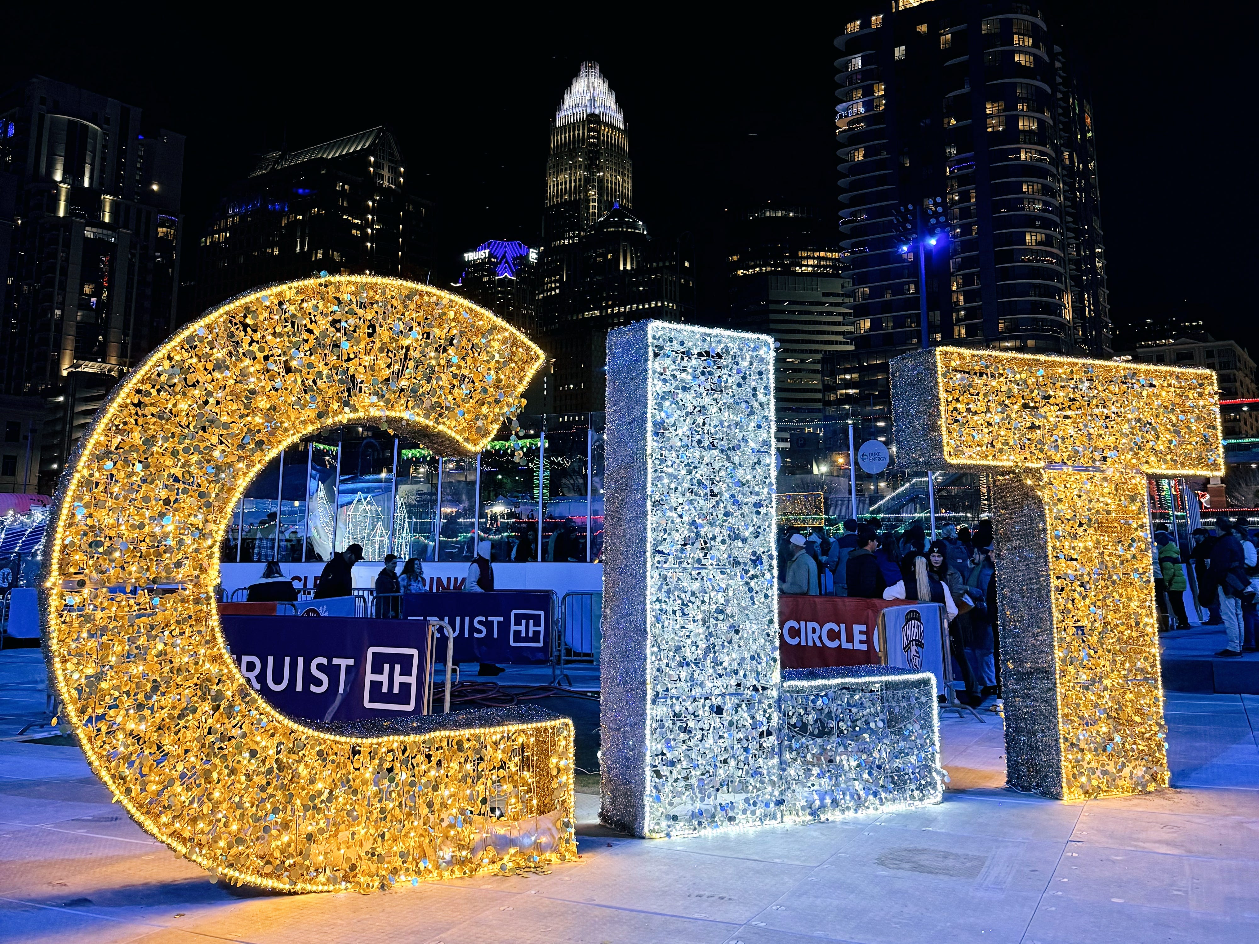 Large lit-up "CLT" letters