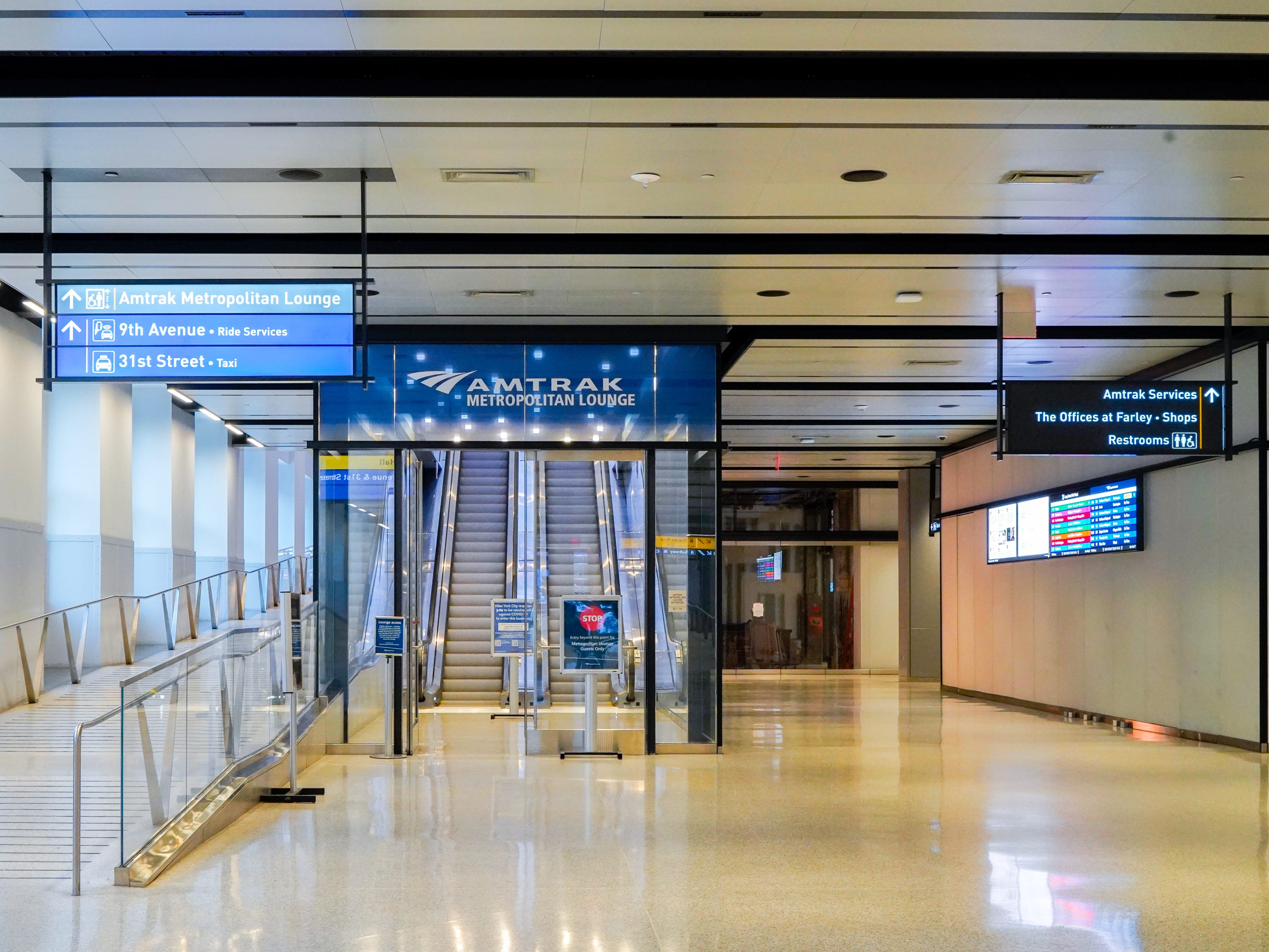 Escalator entrance to Amtrak Lounge at Penn Station in NYC