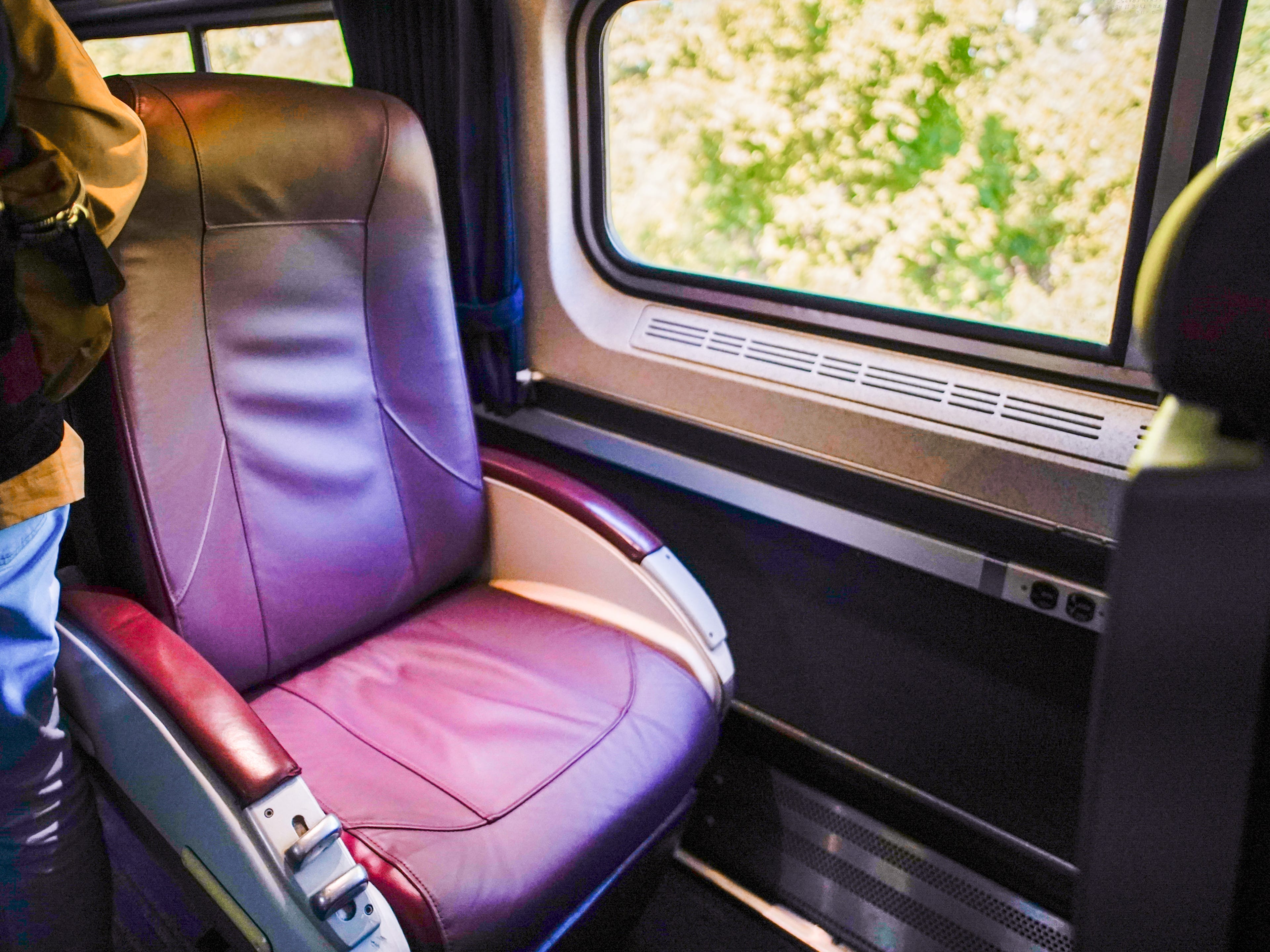 Seat in a business-class Amtrak car
