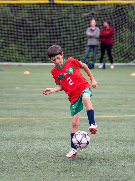 The author's son playing soccer.