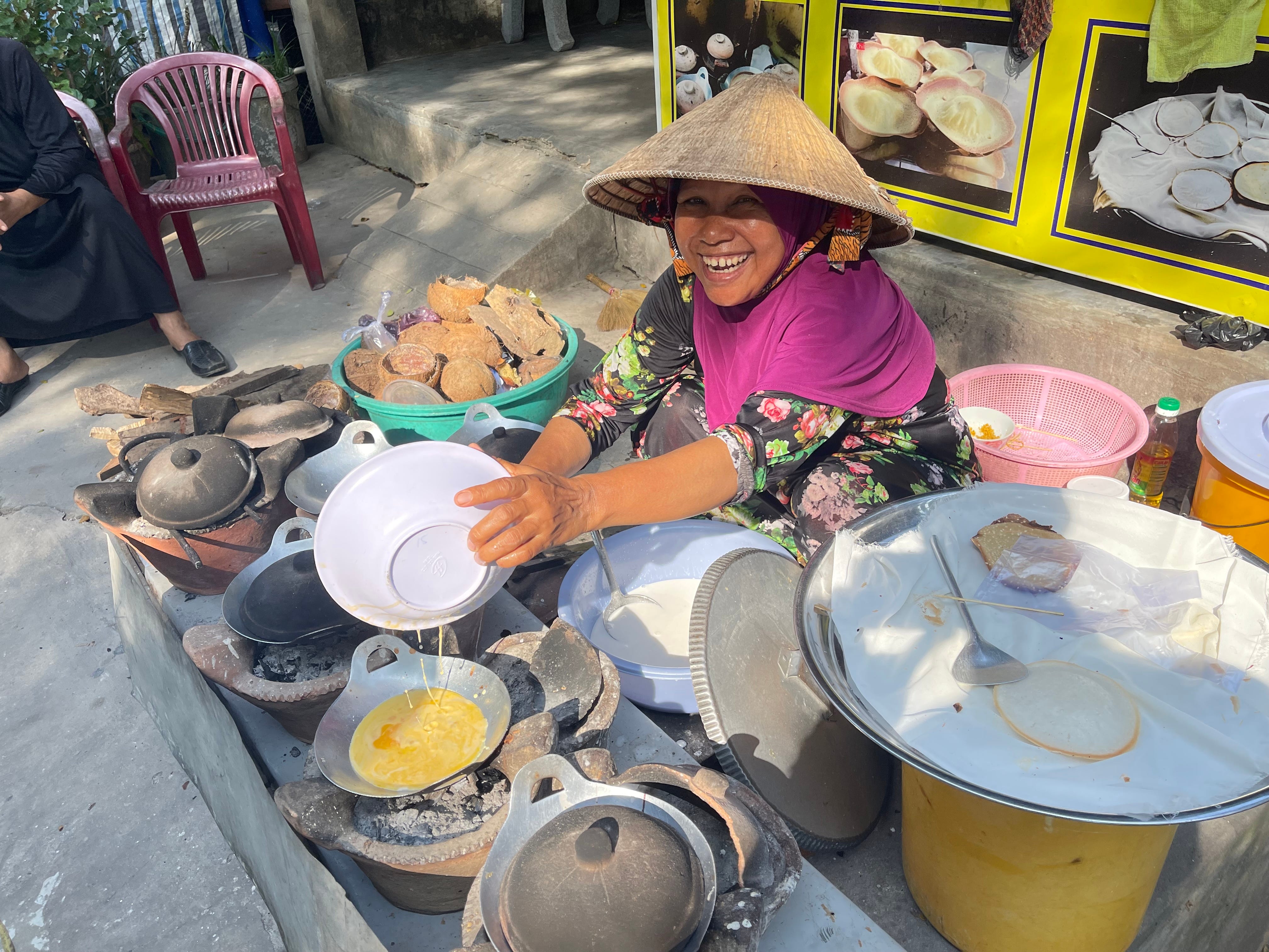 Street food being prepared in Vietnam.