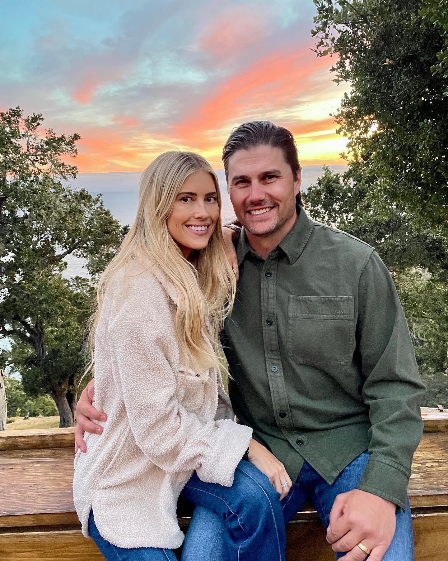 Christina Haack and Josh Hall pose during sunset. 