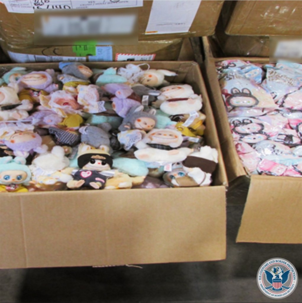 Boxes of counterfeit Labubu toys seized by border patrol.