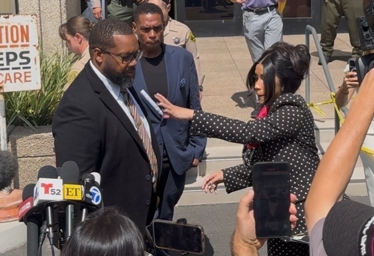 Cardi B throws a marker. 