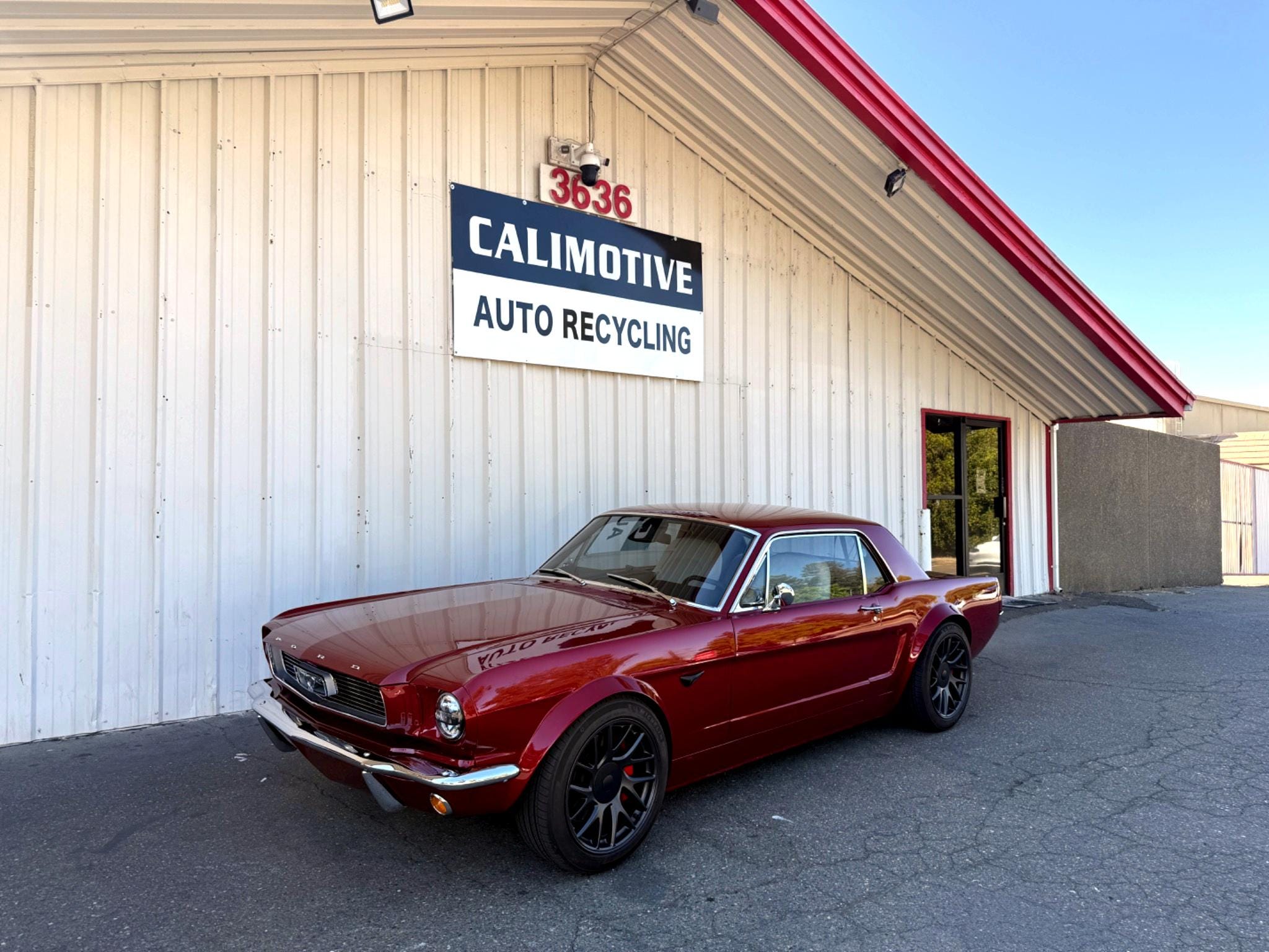 A red converted 1966 Mustang