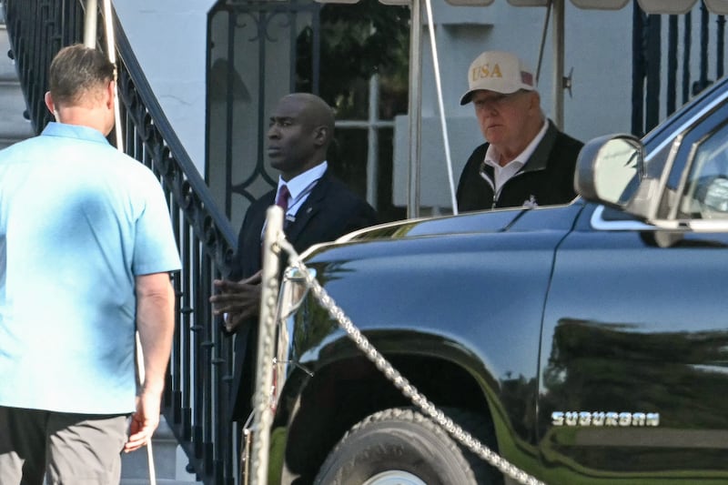 Donald Trump exits the White House and walks to his motorcade, en route to the Trump National Golf Club on September 1, 2025, in Washington, DC.