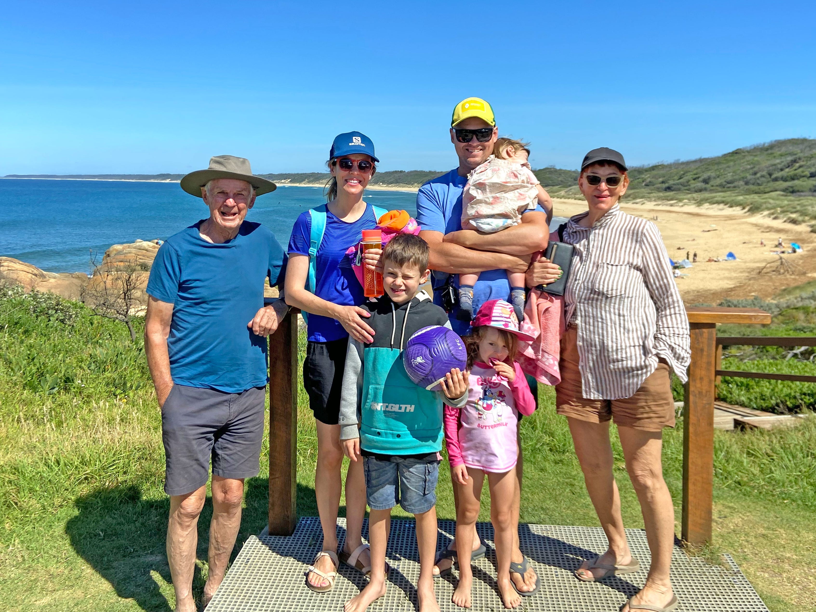 Melissa and her family pose for a photo with her in-laws.