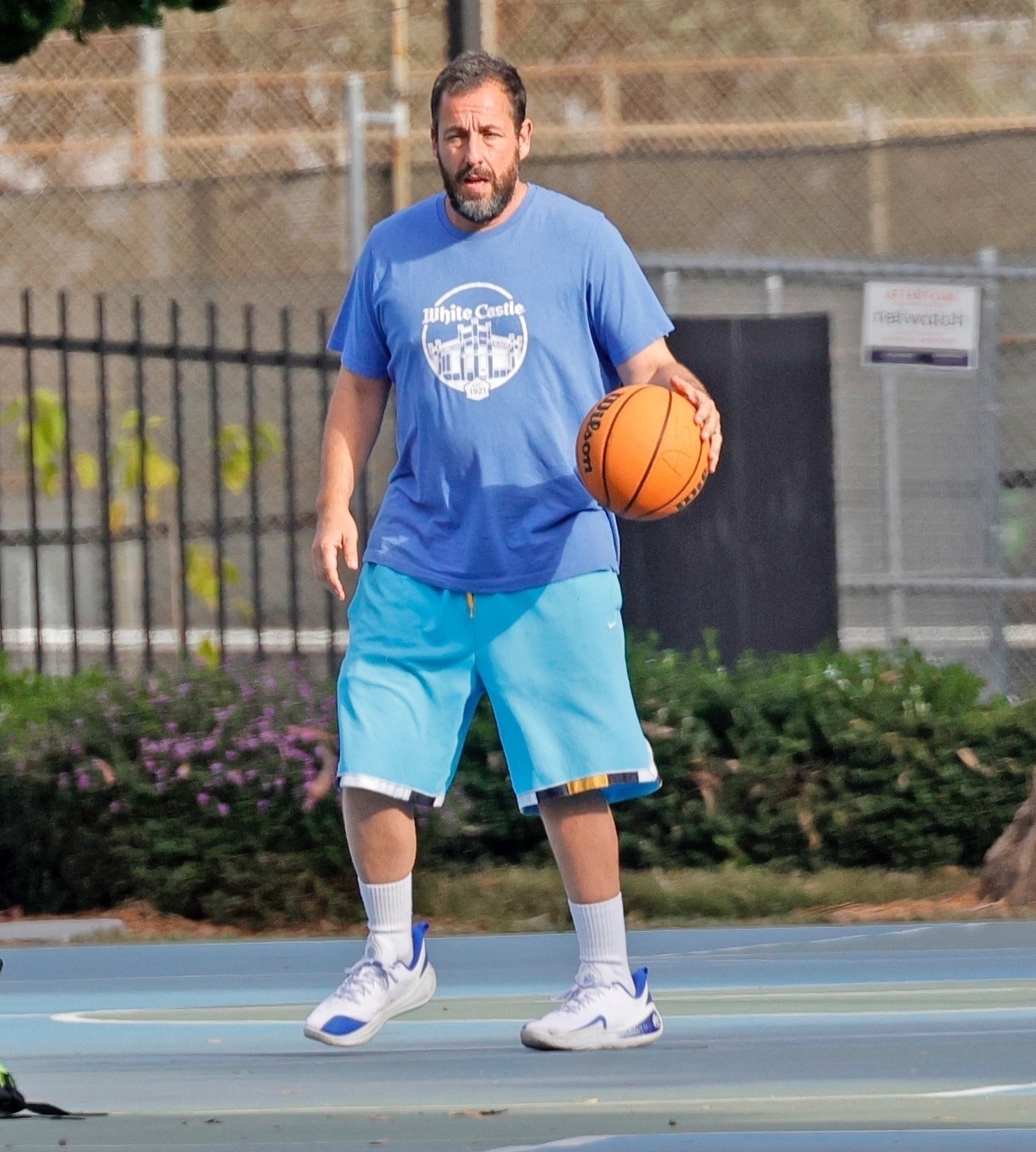 Adam Sandler joins a friendly pick-up basketball game in Los Angeles.