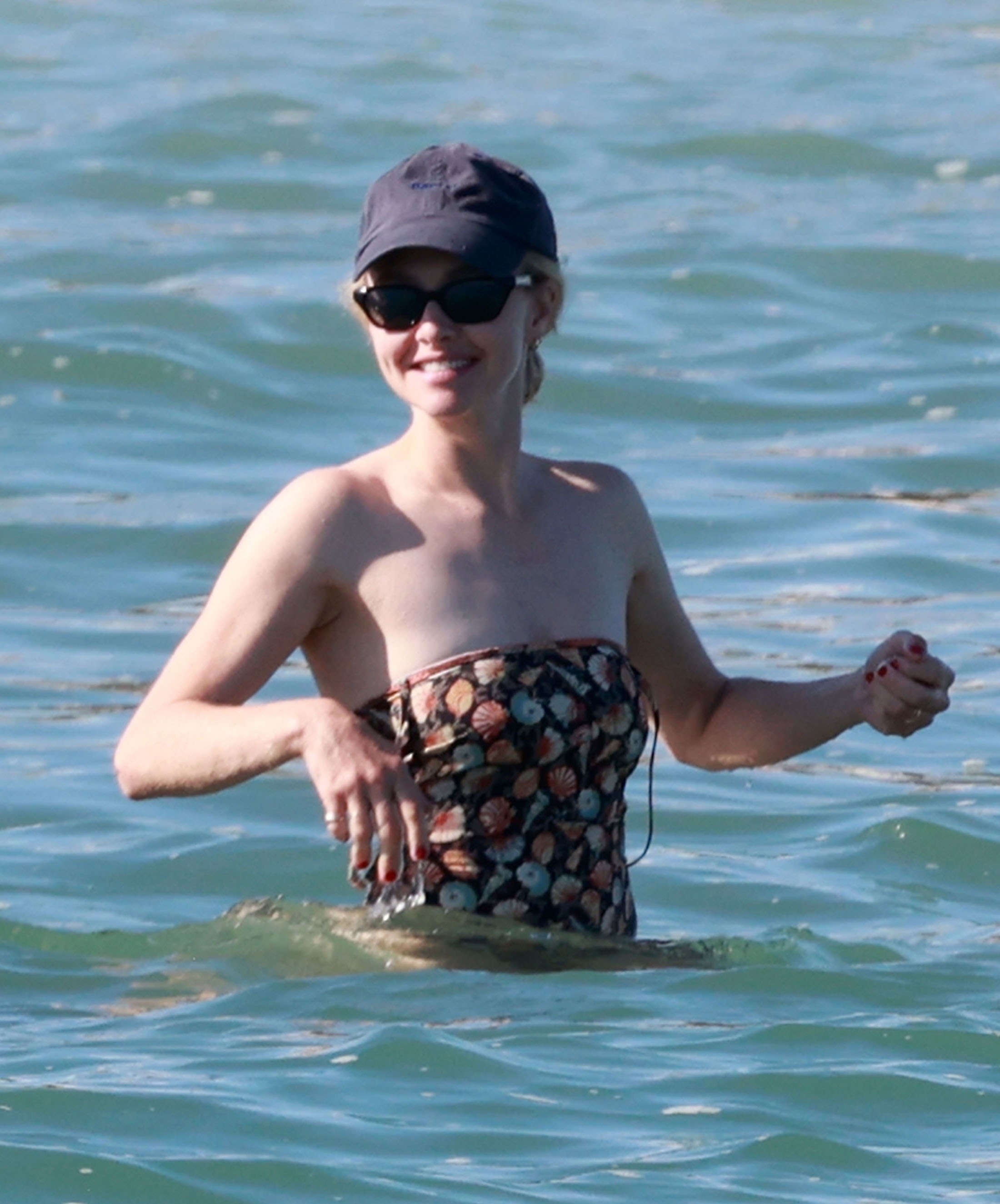 Amanda Seyfried enjoys some downtime on the beach outside the luxurious Excelsior Hotel in Venice 