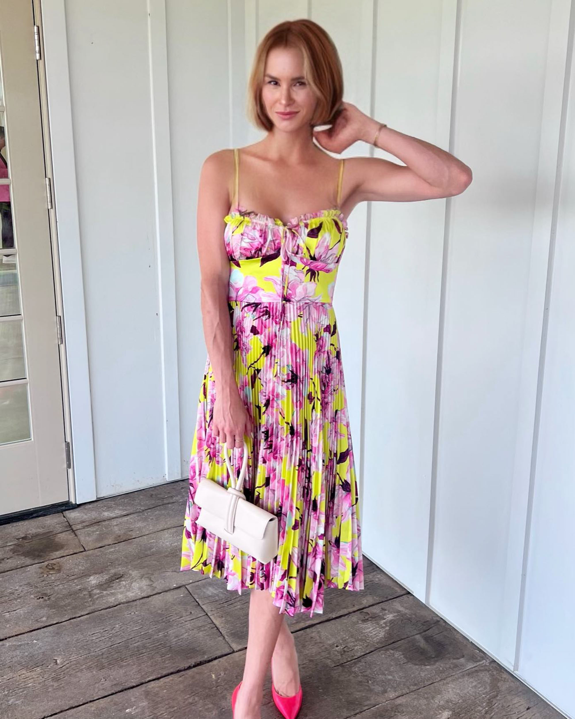 Meghan King in a floral dress. 