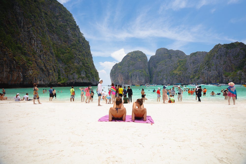 women beach vacation swimming water summer suntan