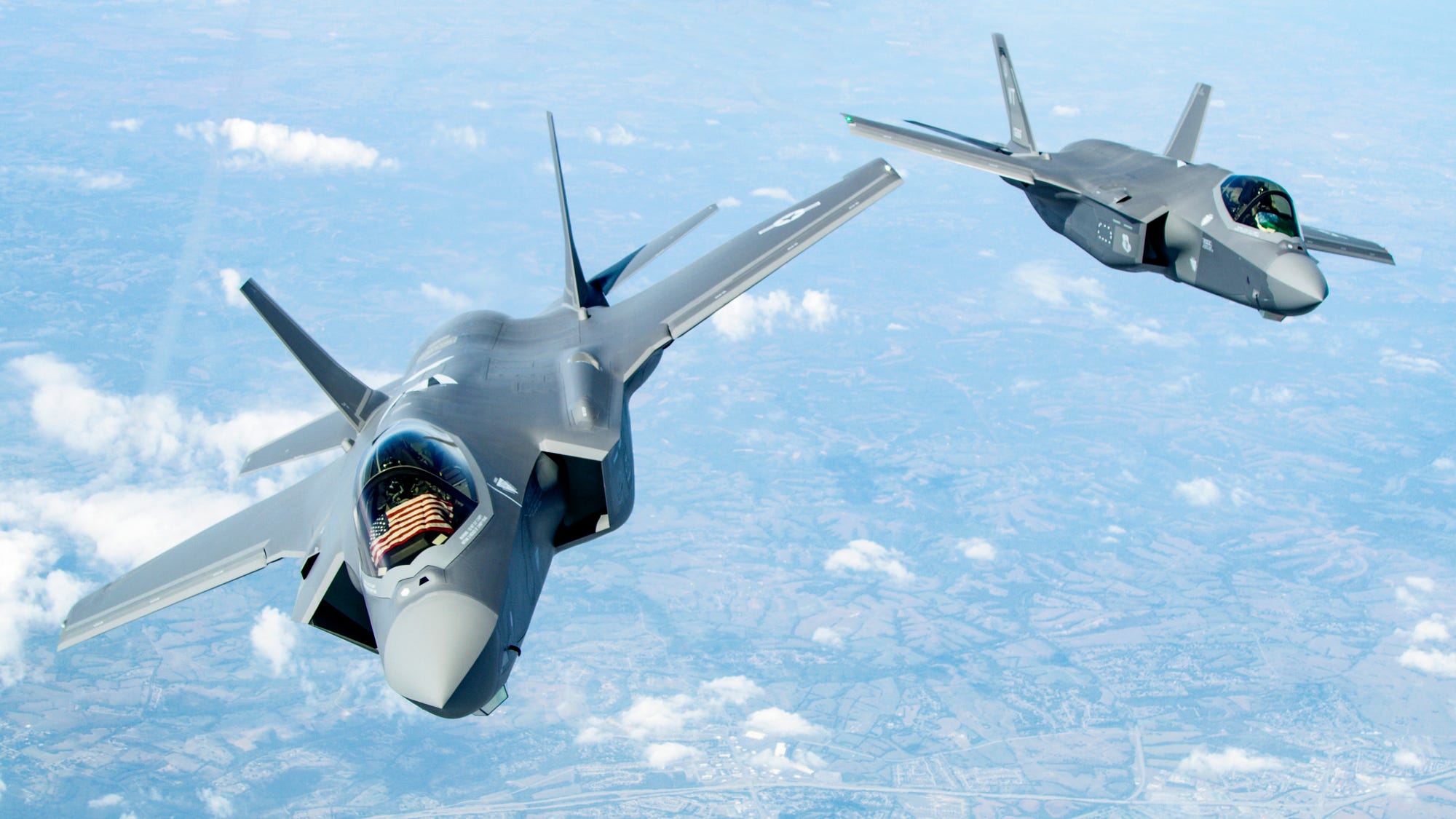 Two F-35 Lightning II's of the Vermont Air National Guard fly over the Midwest Sept. 19, 2019.