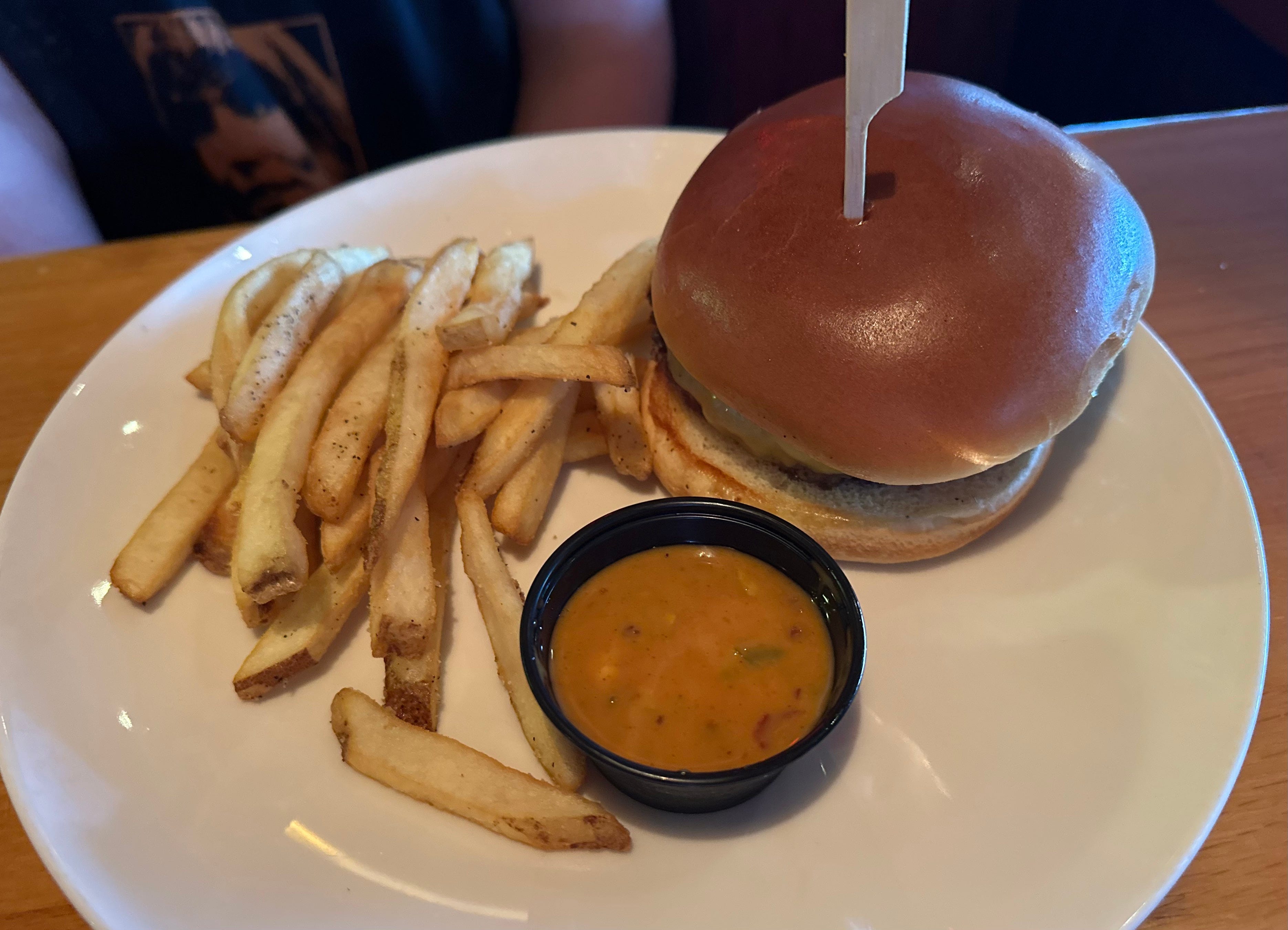 Burger with fries, sauce at Applebees
