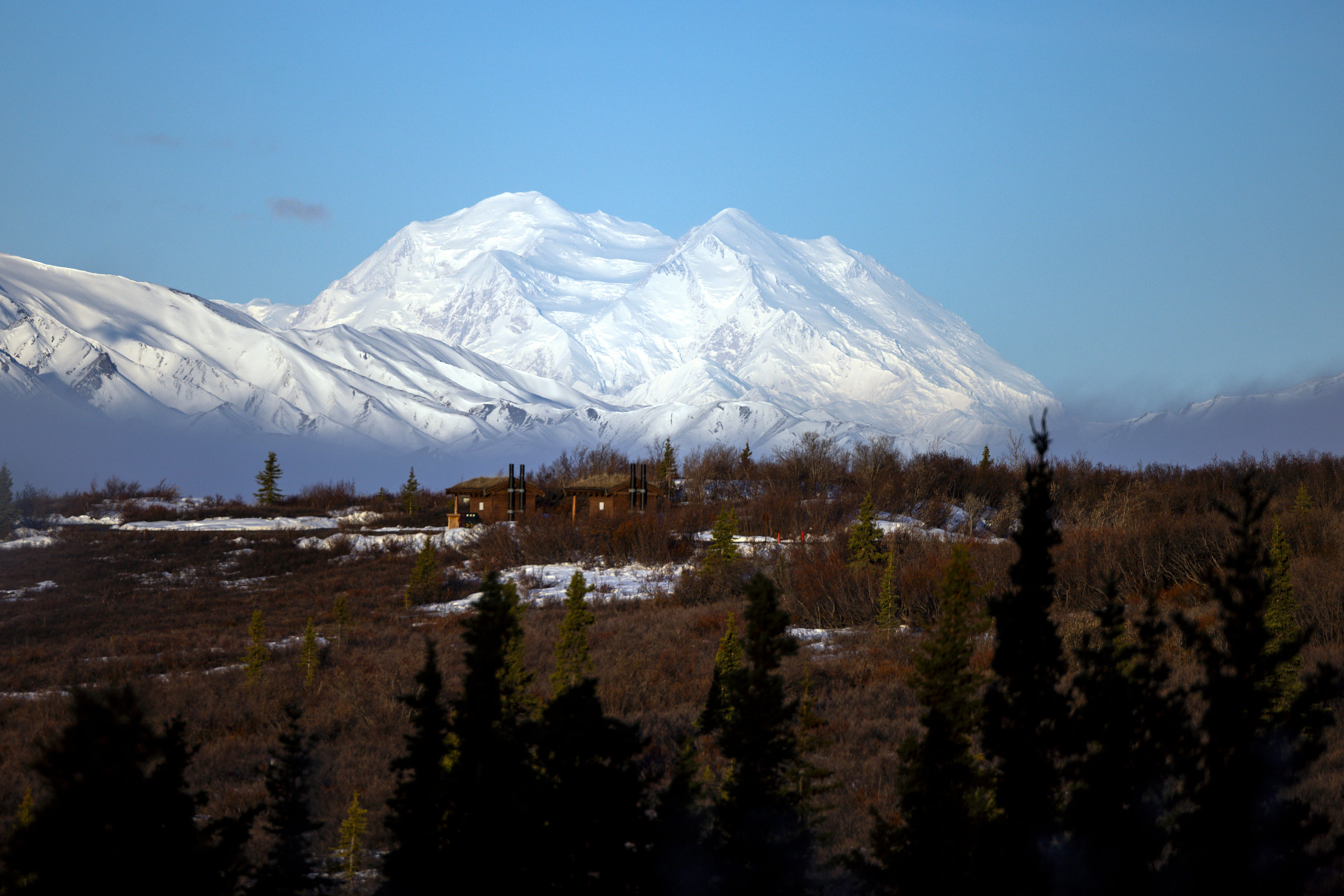 Mount McKinley appears above a fog layer in the early morning hours of May 14, 2025 in Denali National Park, Alaska.