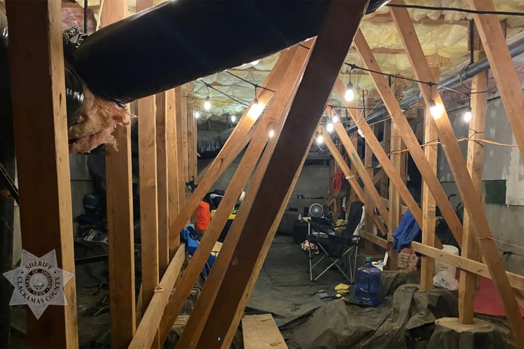 Shocked Oregon condo residents in Happy Valley discovered a squatter hiding out in a crawl space — where cops say he had been living for some time in a makeshift den.