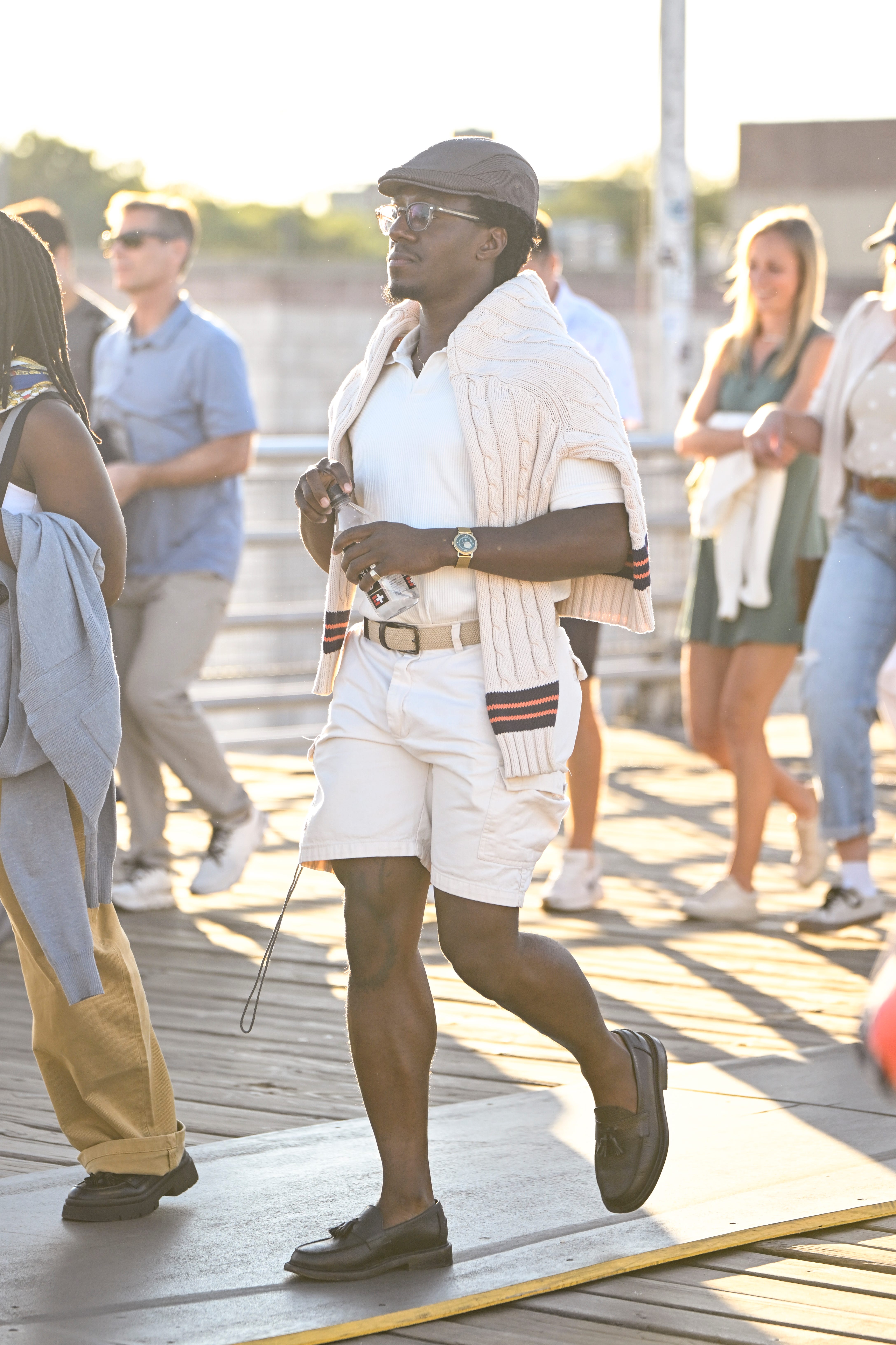 A man in an all white outfit.