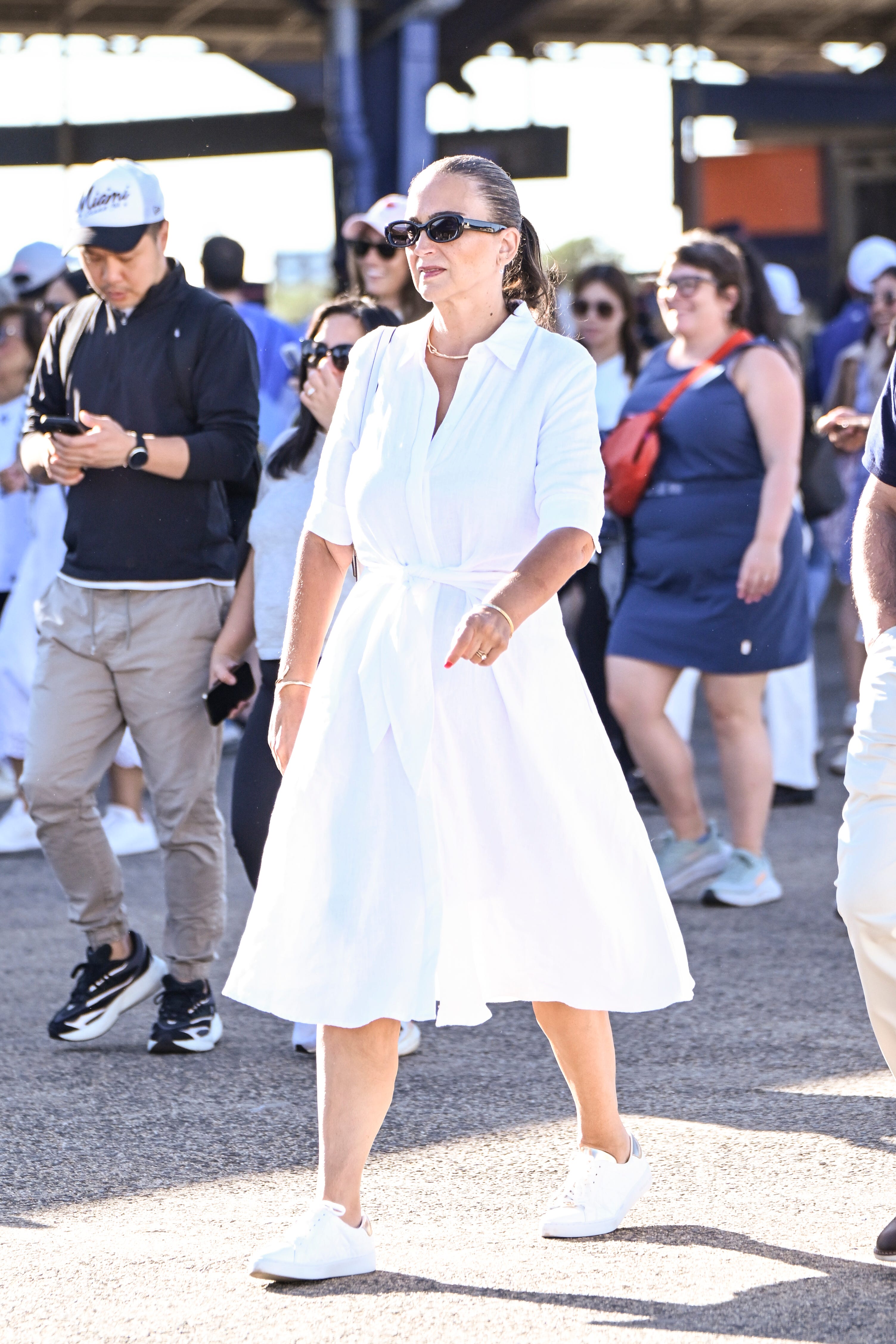 A woman in a white dress.