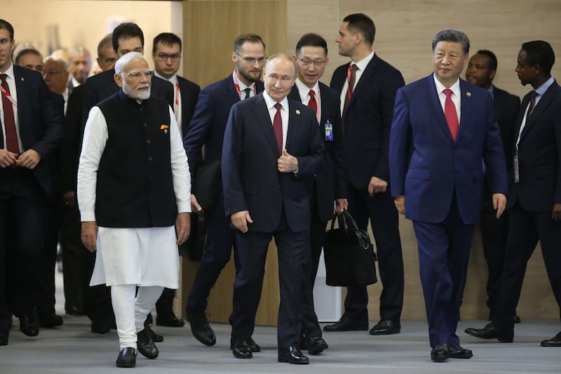 KAZAN, RUSSIA - OCTOBER 23: (RUSSIA OUT) L-R: Indian President Narendra Modi, Russian President Vladimir Putin and Chinese President Xi Jinping attend the BRICS Leader's Summit, on October 23, 2024 in Kazan, Tatarstan Republic, Russia. Putin and representatives of 30 countries are gathering in Kazan for the 16th BRICS Summit today. (Photo by Contributor/Getty Images)