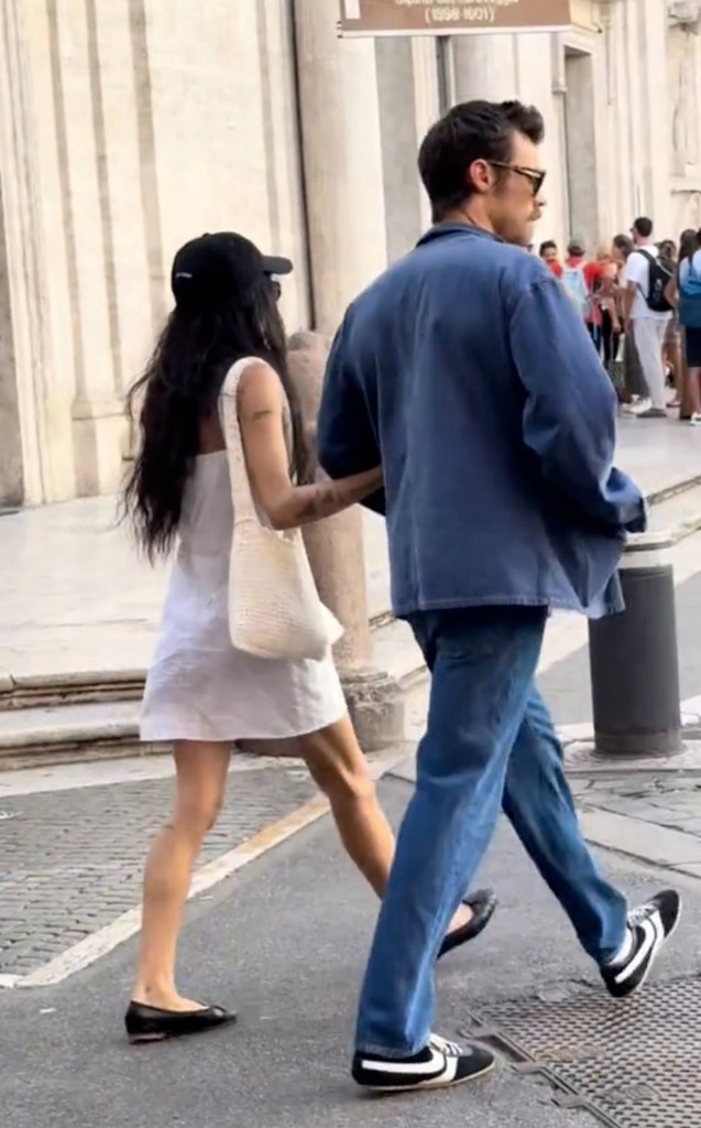 Zoë Kravitz and Harry Styles walking around Rome