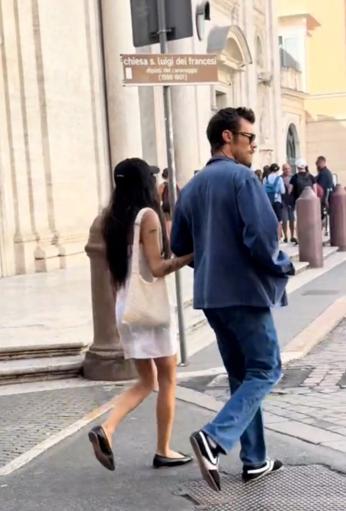 Zoë Kravitz and Harry Styles walking around Rome