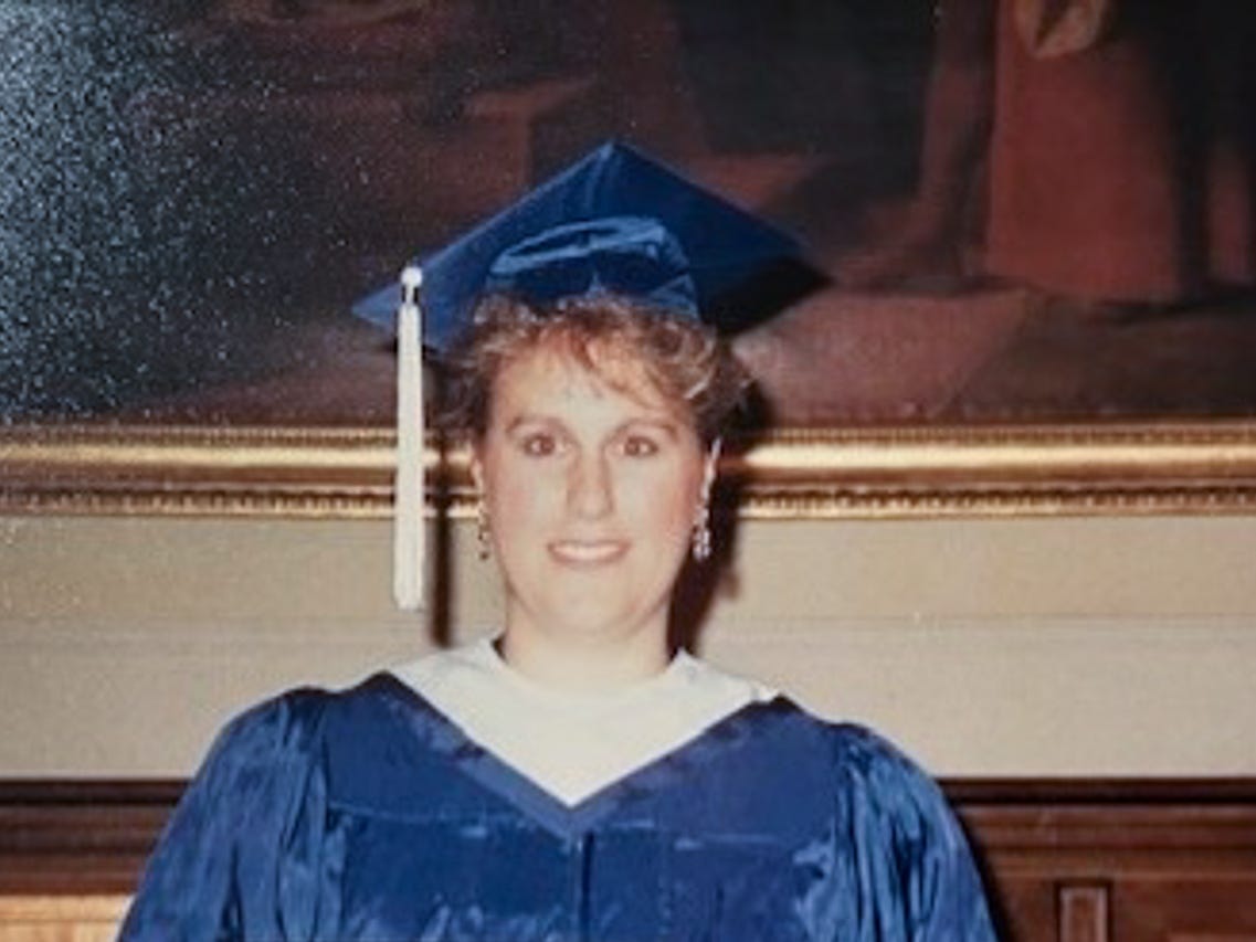 Woman holding degree