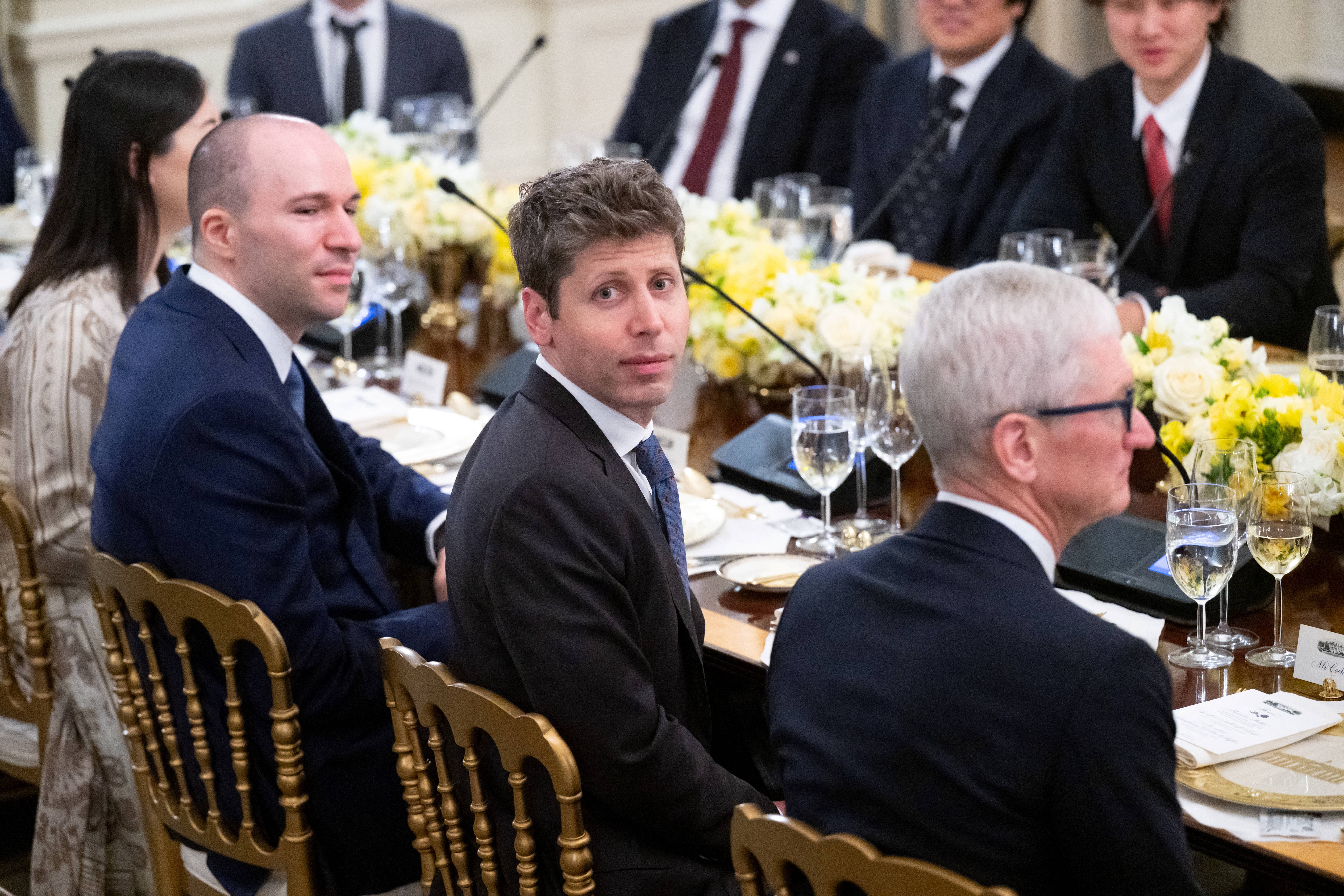 sam altman staring at camera