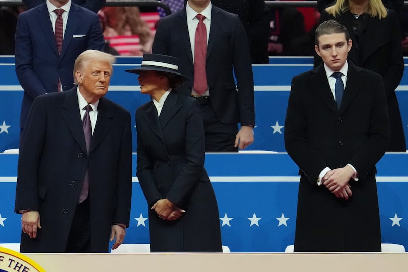 Donald, Melania, and Barron Trump.