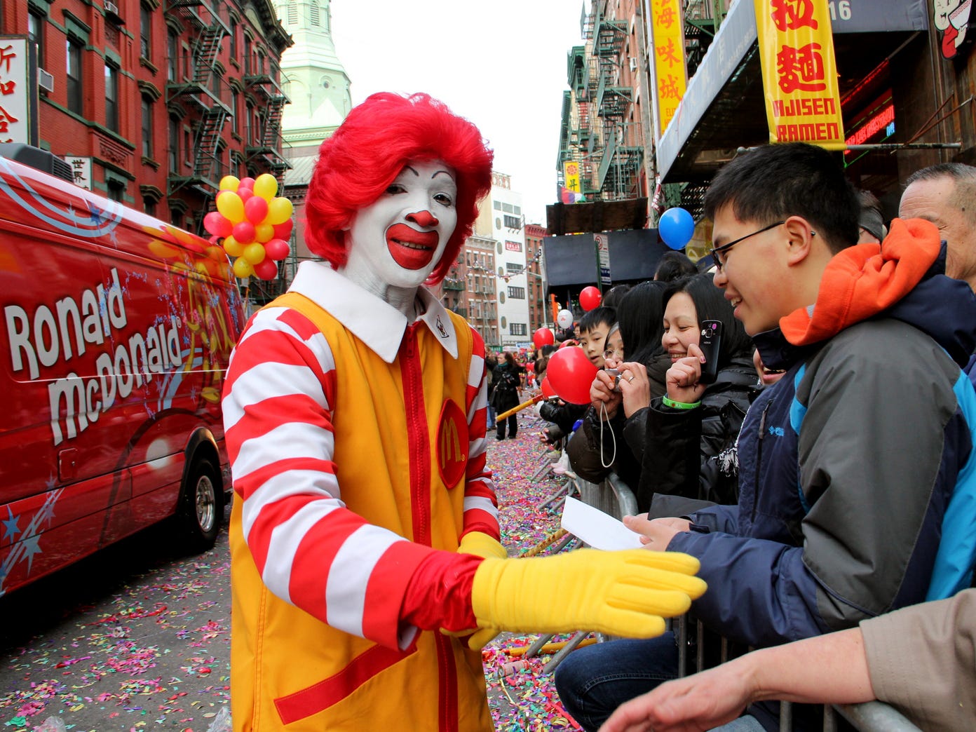 ronald mcdonald, waving, cheering, crowds, fan, hand shaking, mcdonalds, pr, publicity,parade, celebration, lunar new year, chinatown, cny, chinese new year 2012, nyc, january 29 2012, bi, dng