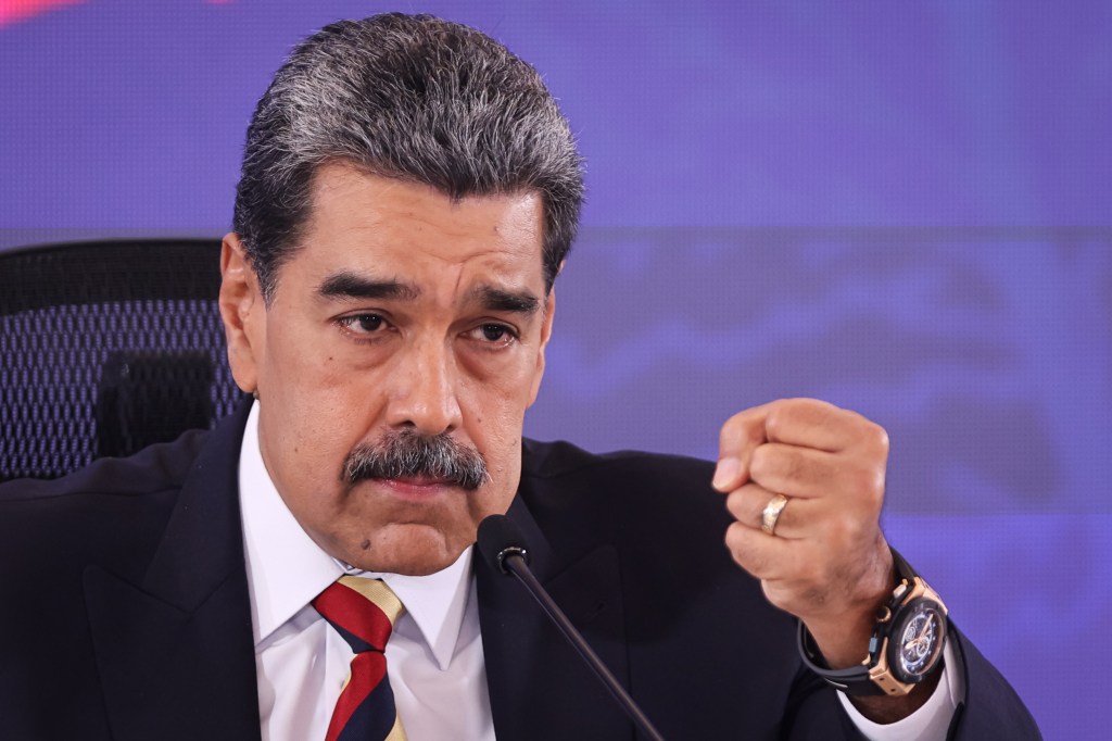 Nicolás Maduro speaking at a press conference.