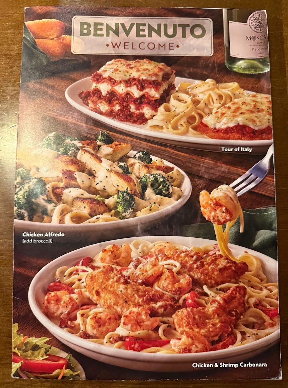 Olive Garden menu reading "Benvenuto - Welcome"