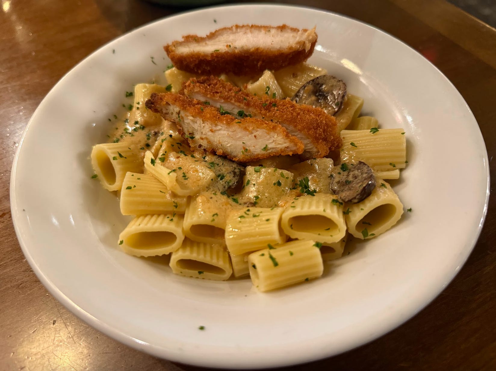 Olive Garden never-ending pasta rigatoni with creamy mushroom sauce and chicken fritta