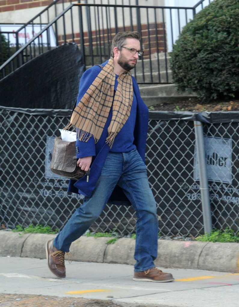 Tim Mynett walking down a sidewalk in Washington, D.C.
