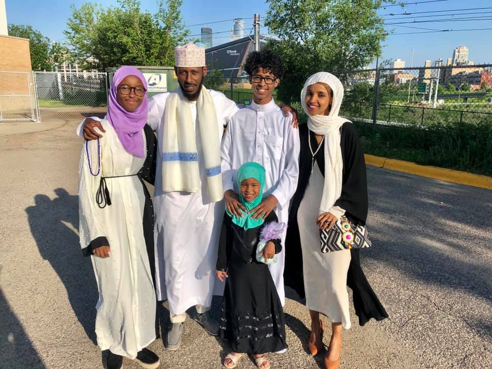 Photo of Ahmed Hirsi, Ilhan Omar, and their children.