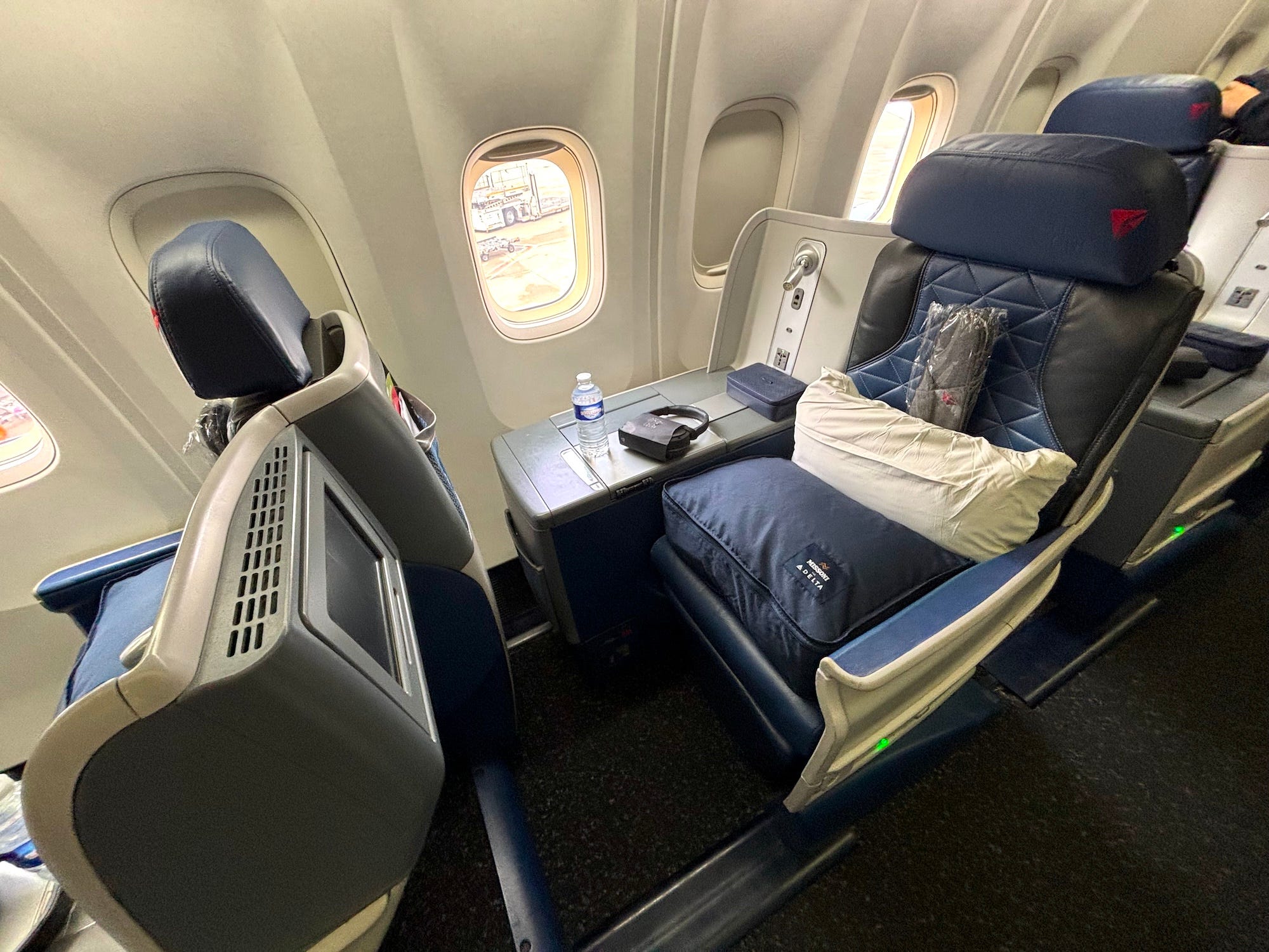 A business class seat on an international Delta plane.