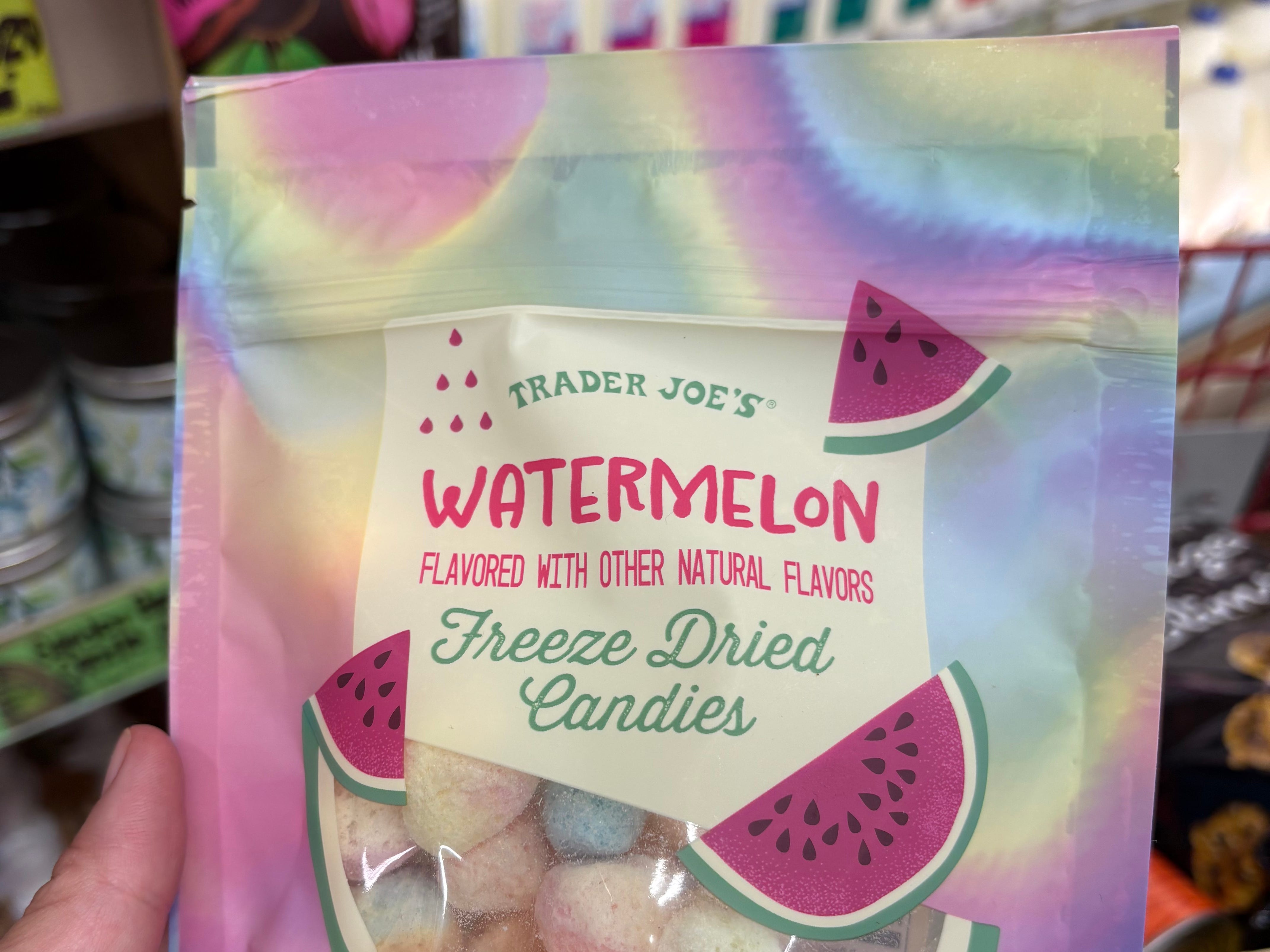 The author holding a bag of Trader Joe's watermelon freeze-dried candies.
