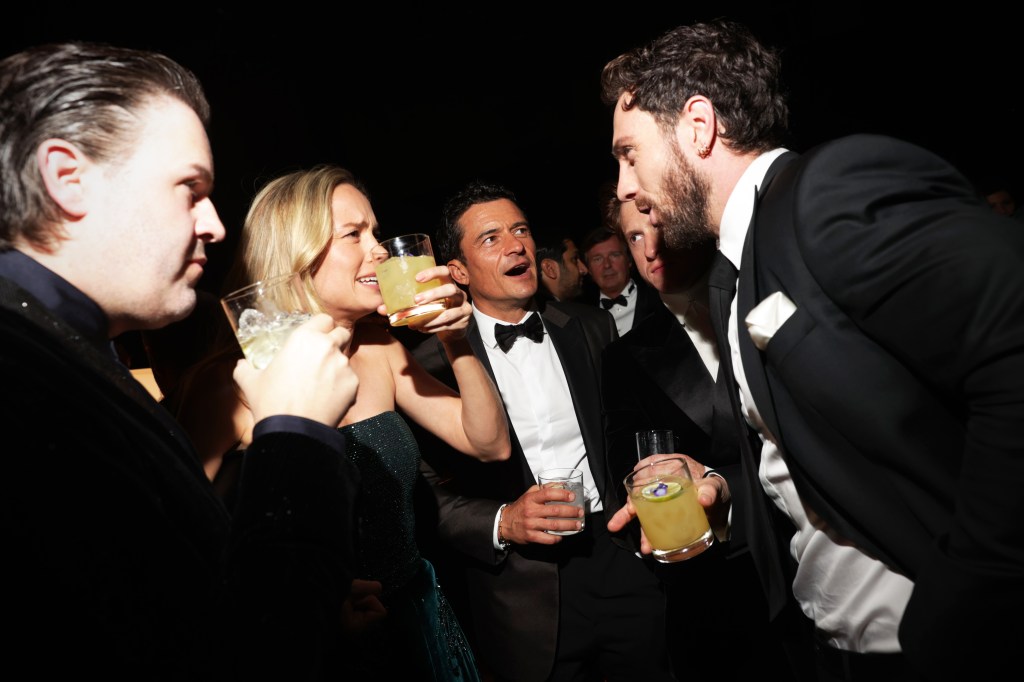 Brie Larson, Orlando Bloom, and Aaron Taylor-Johnson at a Giorgio Armani after-party.
