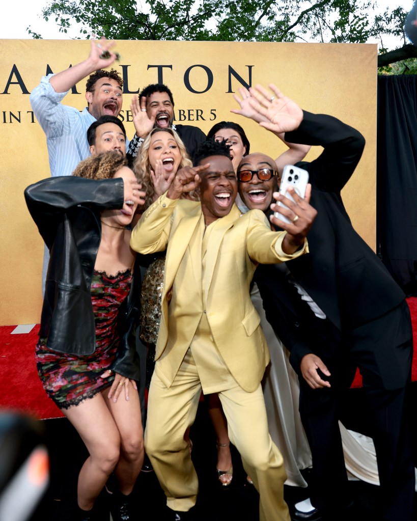 Leslie Odom Jr. (gold suit) snaps a selfie with most of the original cast of “Hamilton,” including creator Lin-Manuel Miranda, Daveed Diggs and Phillipa Soo, at a special performance of the show at the Delacorte Theater.
