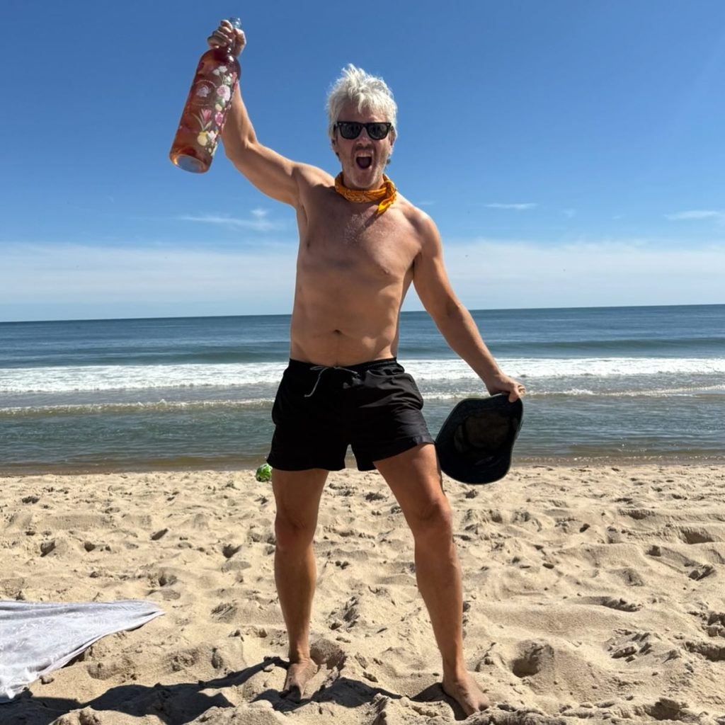 Andy Cohen has found the perfect work-life balance: maximum wine and infinite shoreline  in the Hamptons.
