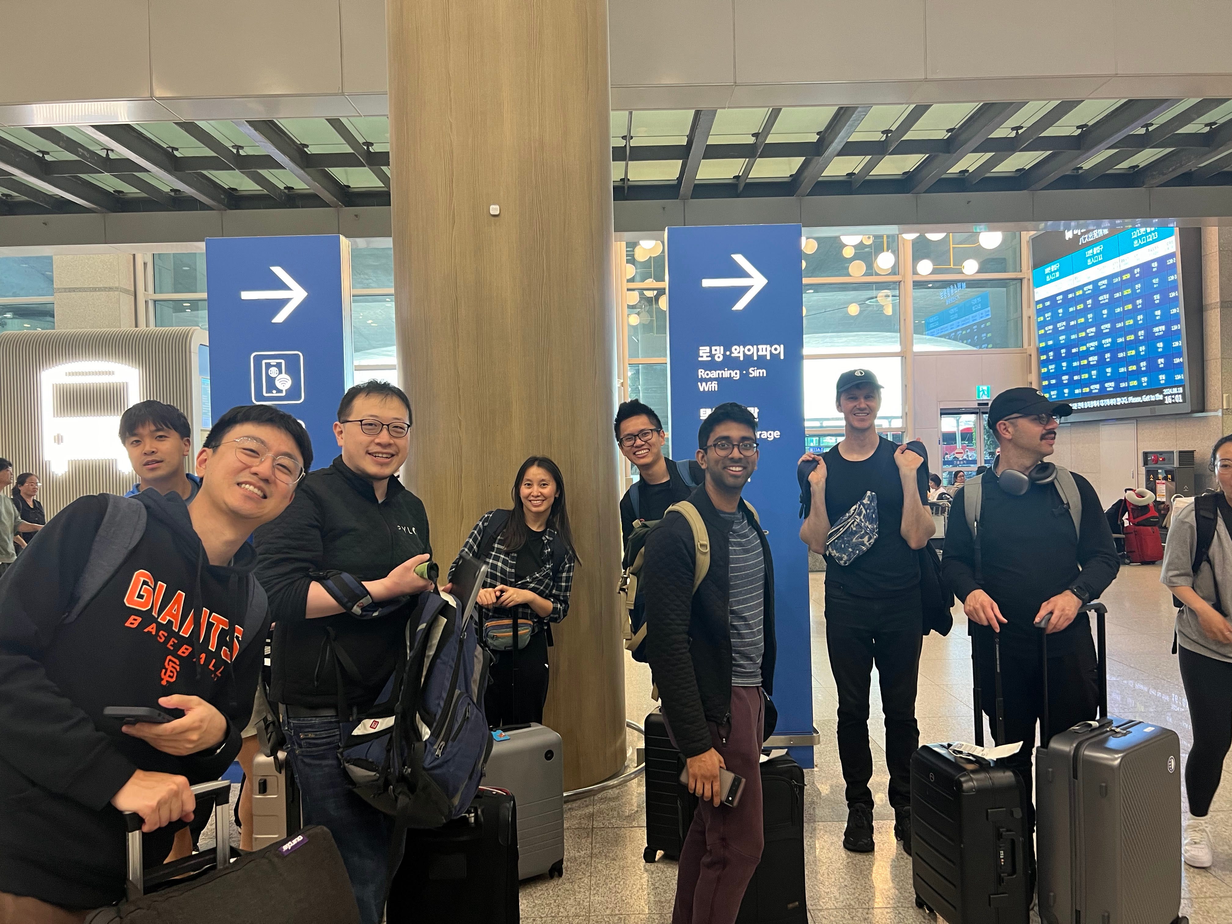 The Pylon team is pictured in the Seoul airport.