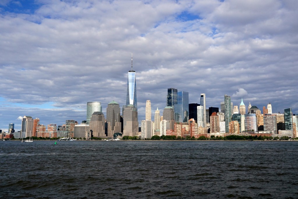 The World Trade Center towers over lower Manhattan, where median rent has hit a record $4,700 a month despite the Airbnb crackdown.