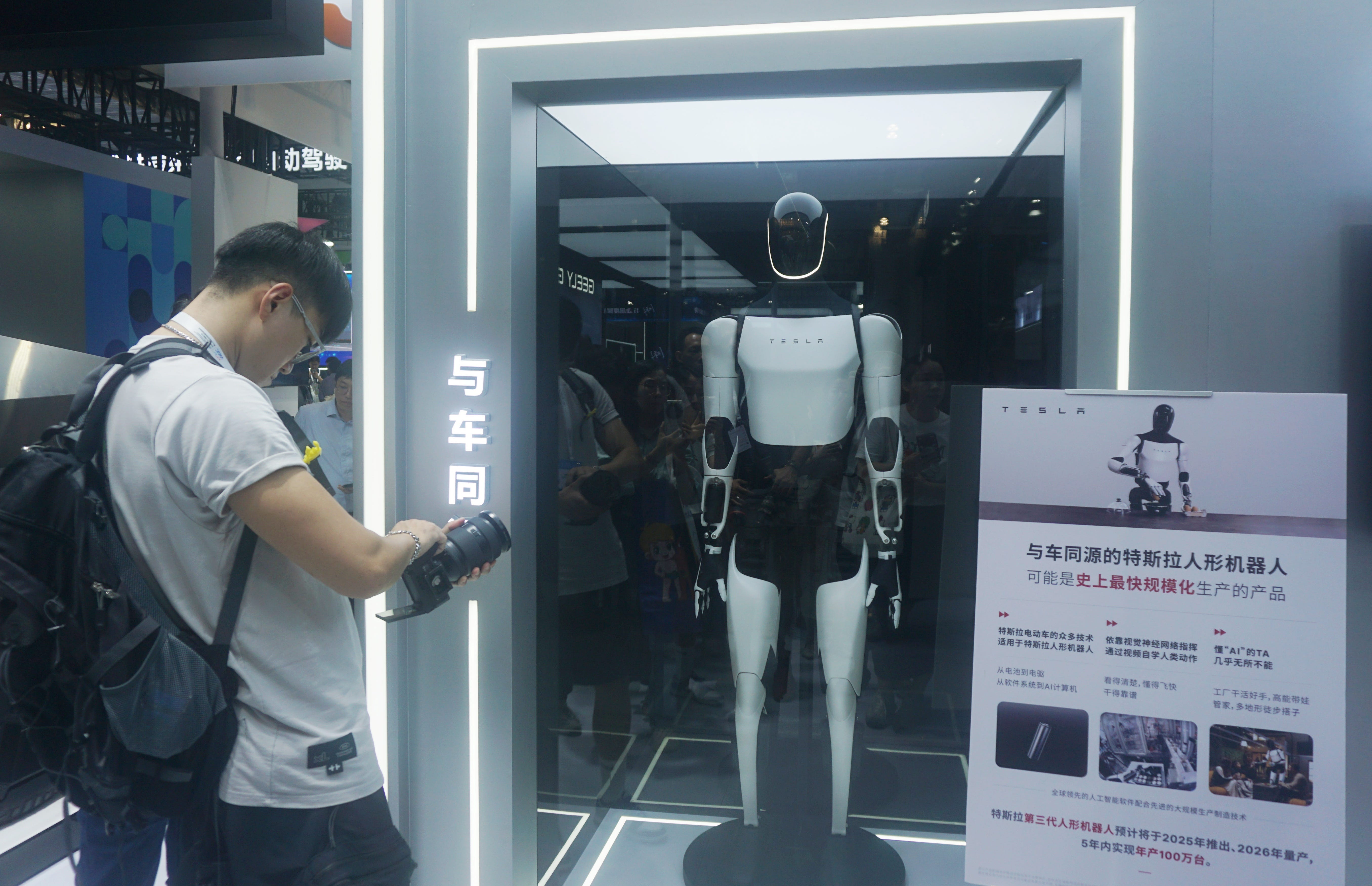 Visitors visit Tesla's humanoid robot