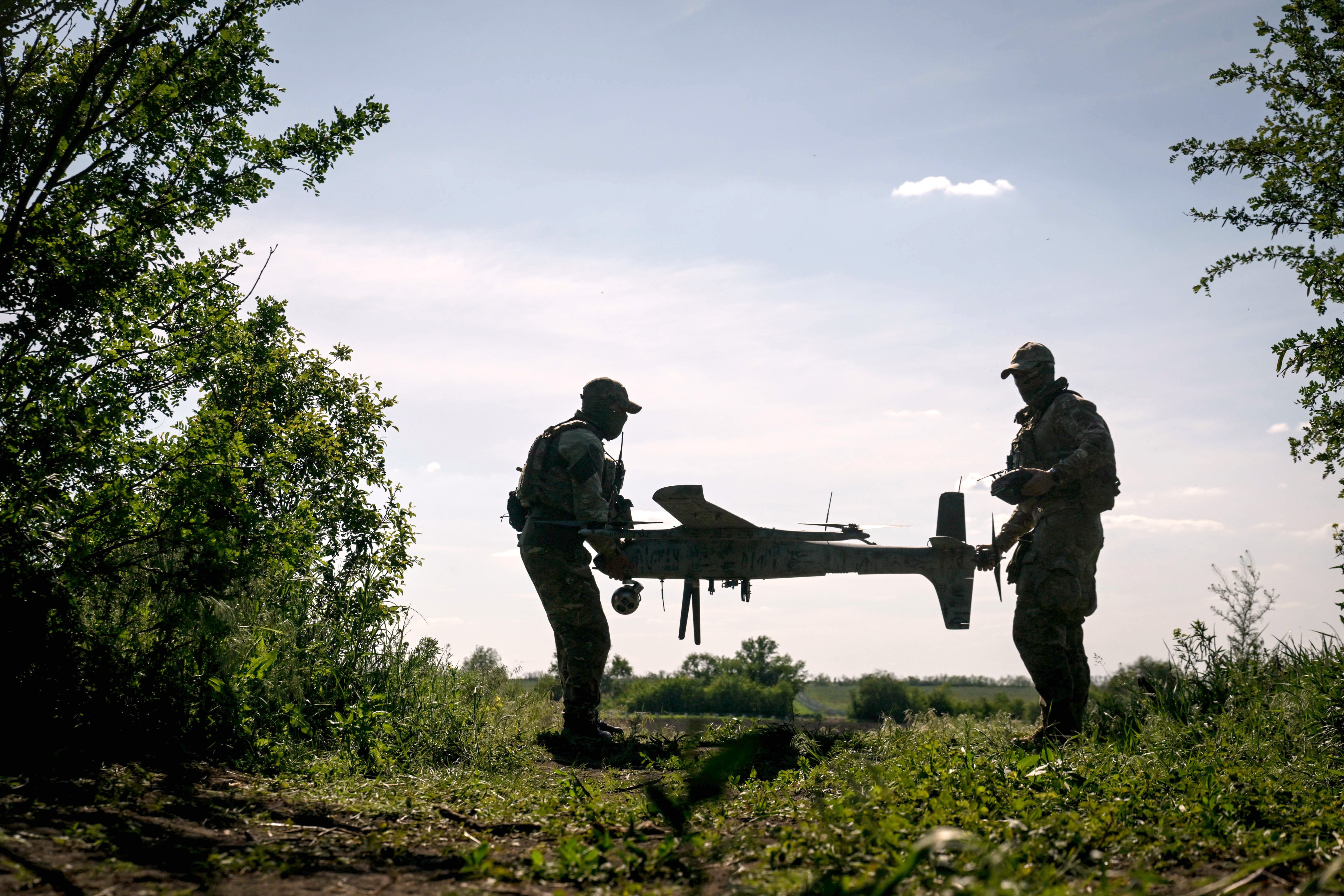 Soldiers of an unmanned aerial complex unit of the Striletskyi Special Forces Police Battalion under the Main Department of the National Police in Zaporizhzhia region prepare a Ukraine-made GARA UAV for an aerial reconnaissance mission in Zaporizhzhia region, Ukraine, on May 23, 2025.