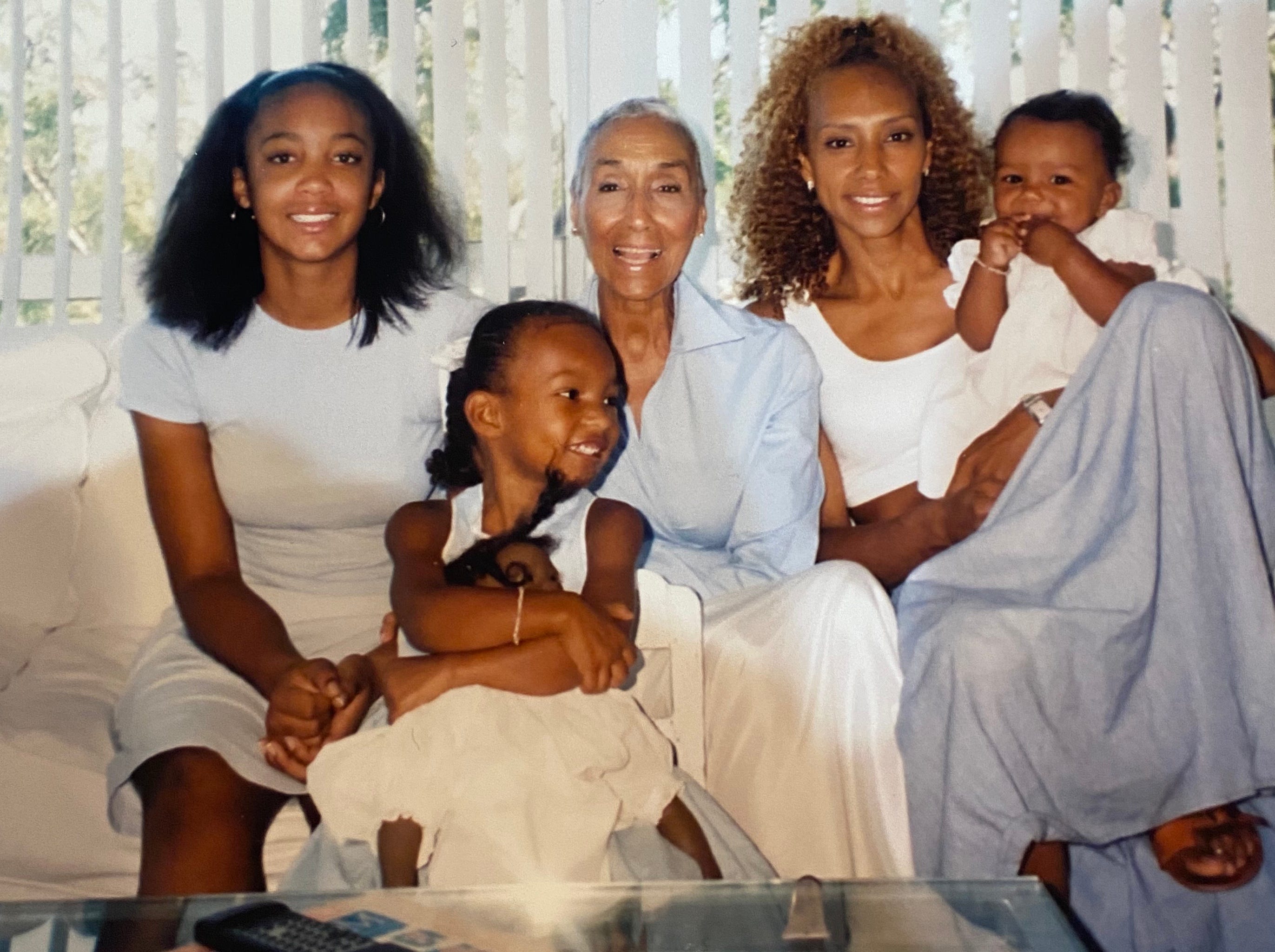 Aliya, her sister Carley as a baby, her cousin, Shanna, and her mom, Liza, and Millie. Taken in Millie's home.