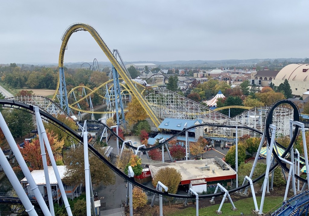 Aerial view of amusement park roller coasters.