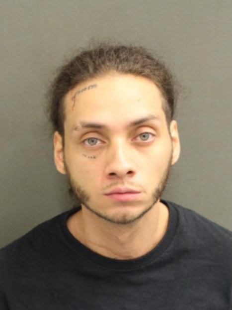 Mugshot of Jason Wilfredo Rosario.