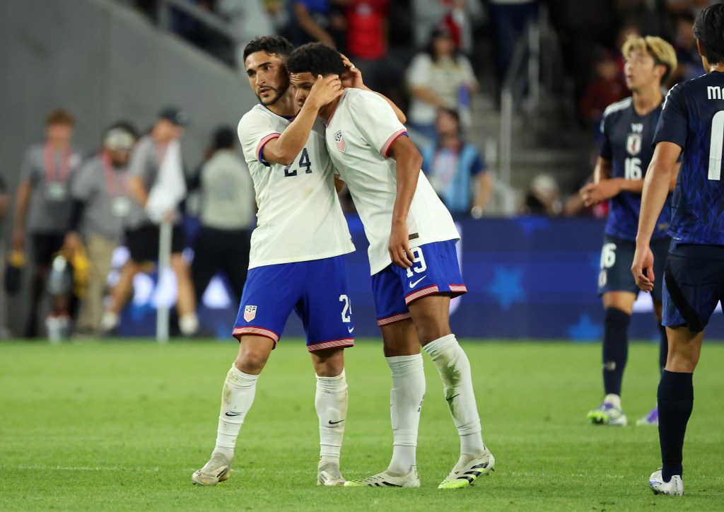 US Men's National Team defender Sergino Dest (2) celebrates with defender Nathan Harriel (19) after the game against Japan at Lower.com Field.