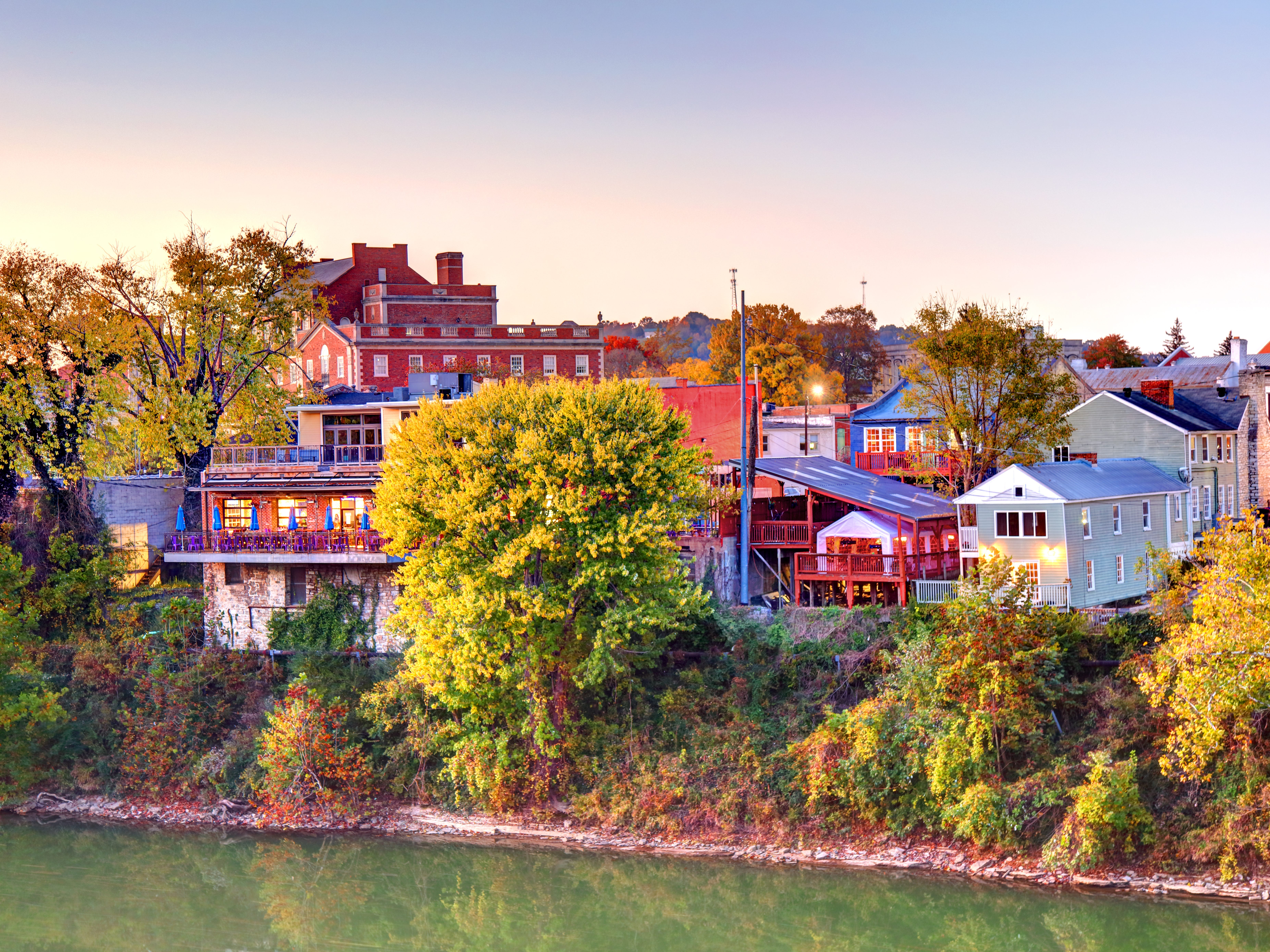 The riverfront of Frankfort, Kentucky with brick factories and family homes.