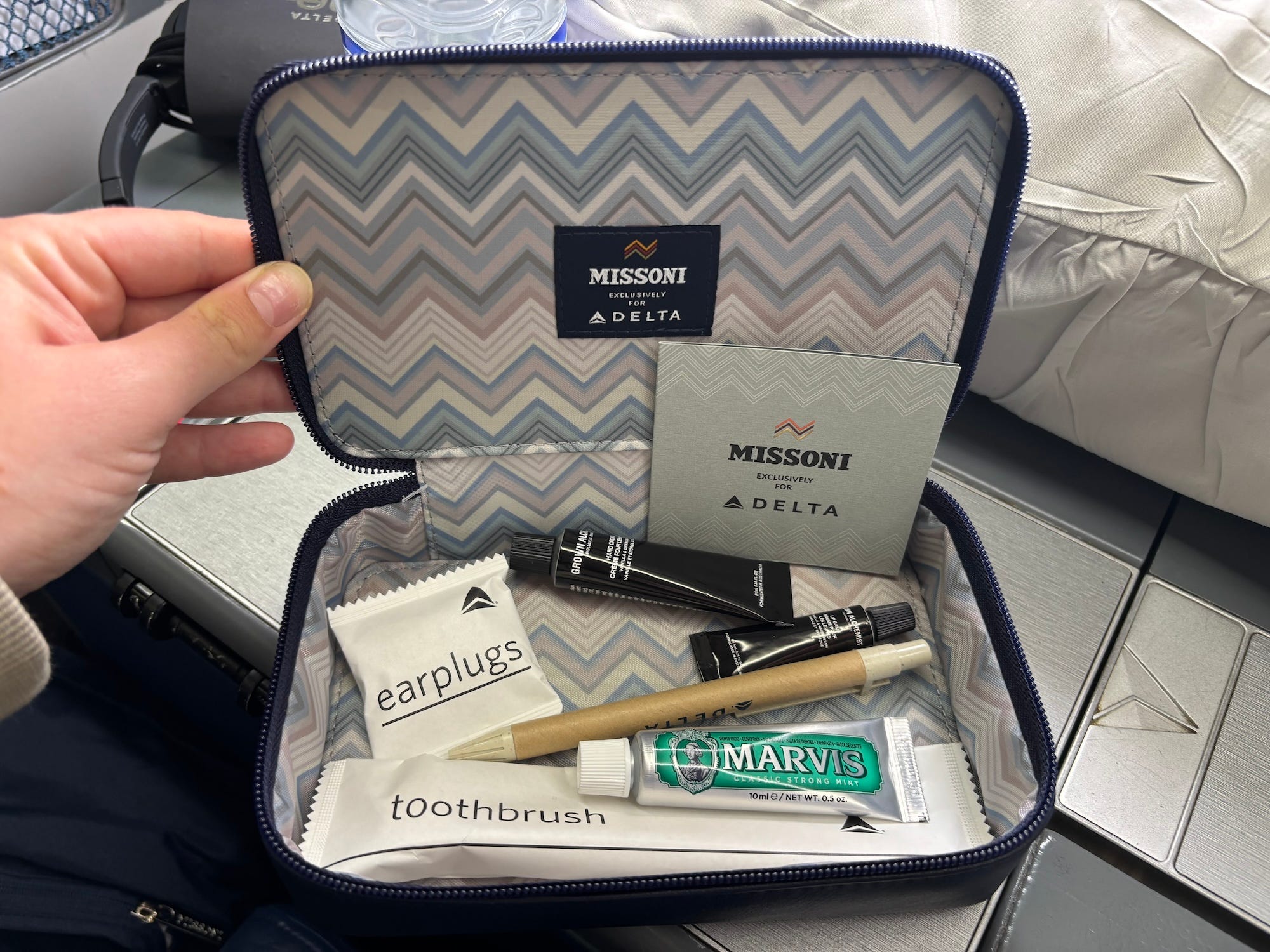 A Missoni kit on a Delta One plane full of amenities.