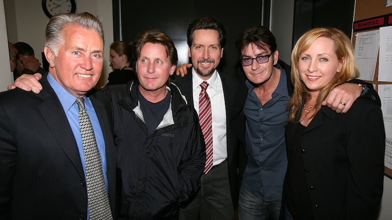 LOS ANGELES, CA - FEBRUARY 21: (L-R) Cast member Martin Sheen poses with his family Emilio Estevez, Ramon Estevez, Charlie Sheen and Renee Estevez backstage after the opening night performance of